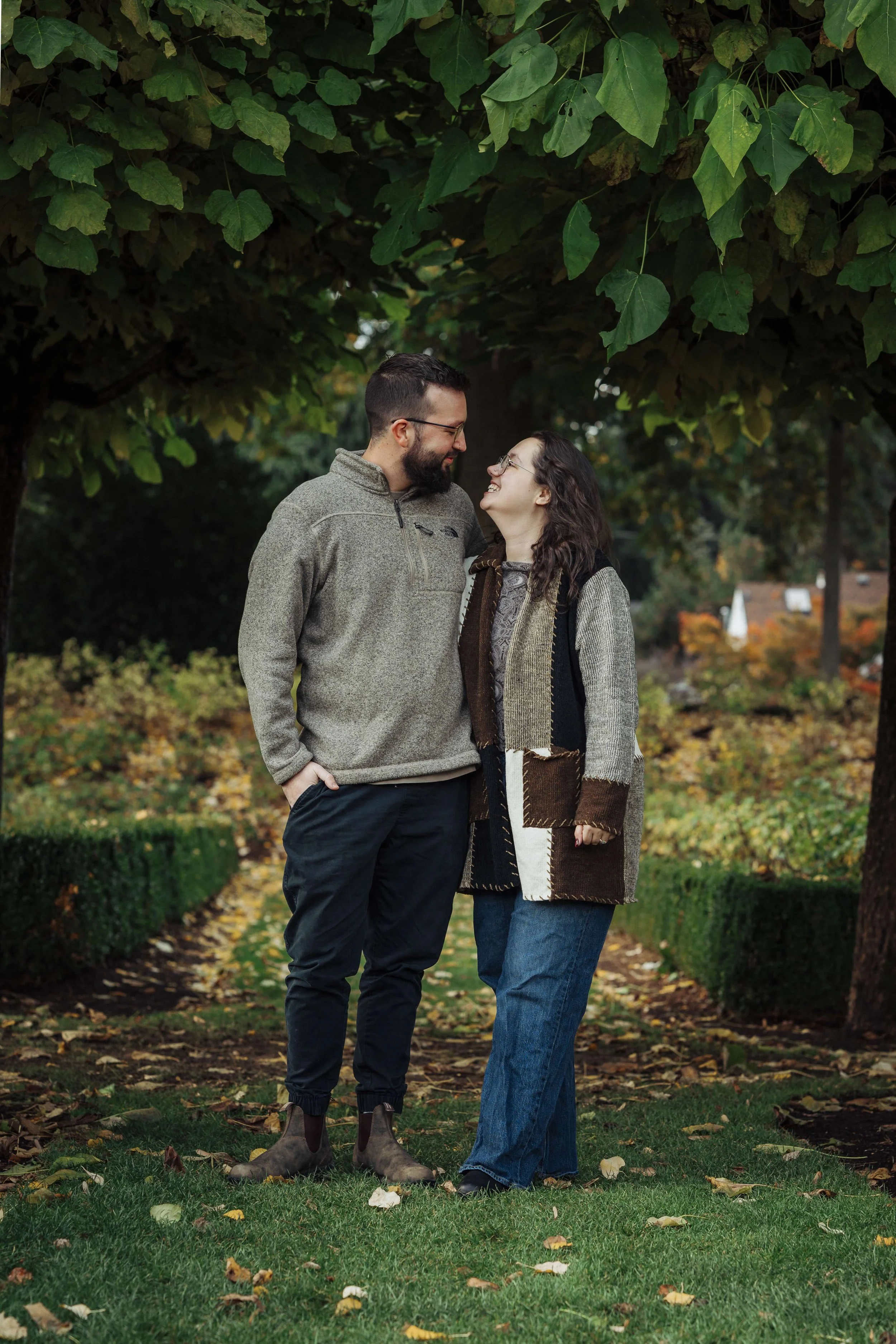 Engagement photograph taken by PNW engagement photographer park nature romantic