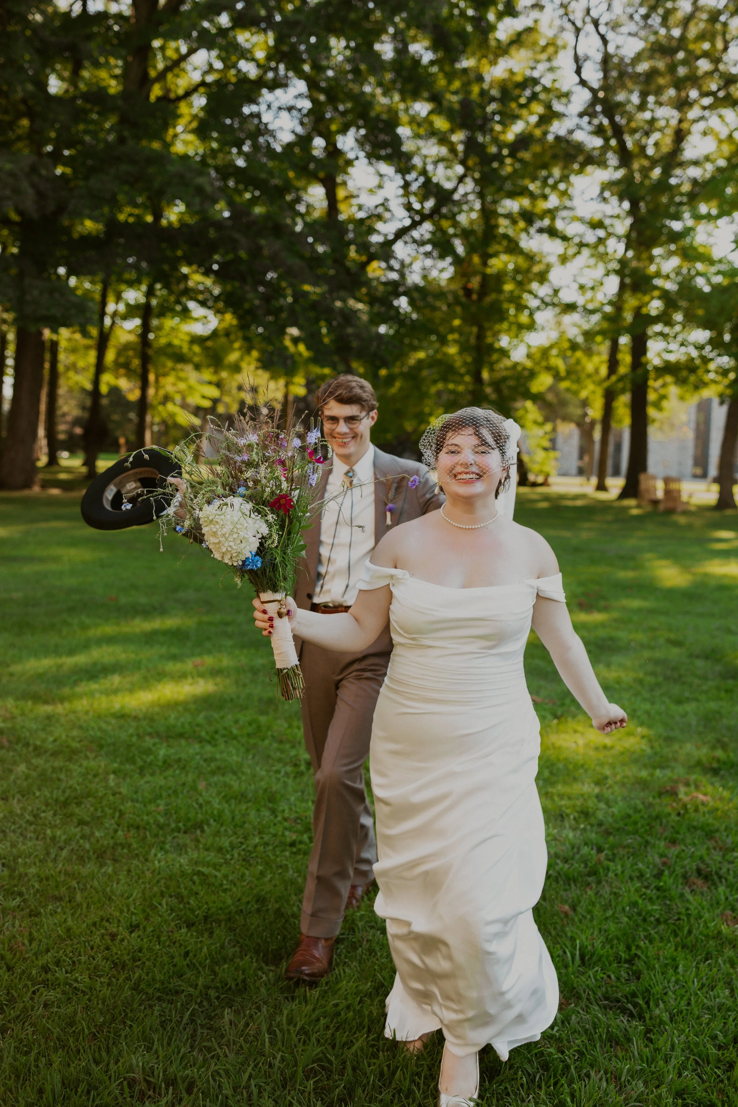 Wedding photographer in Minneapolis, young couple, cinematic wedding photos, summer wedding photos