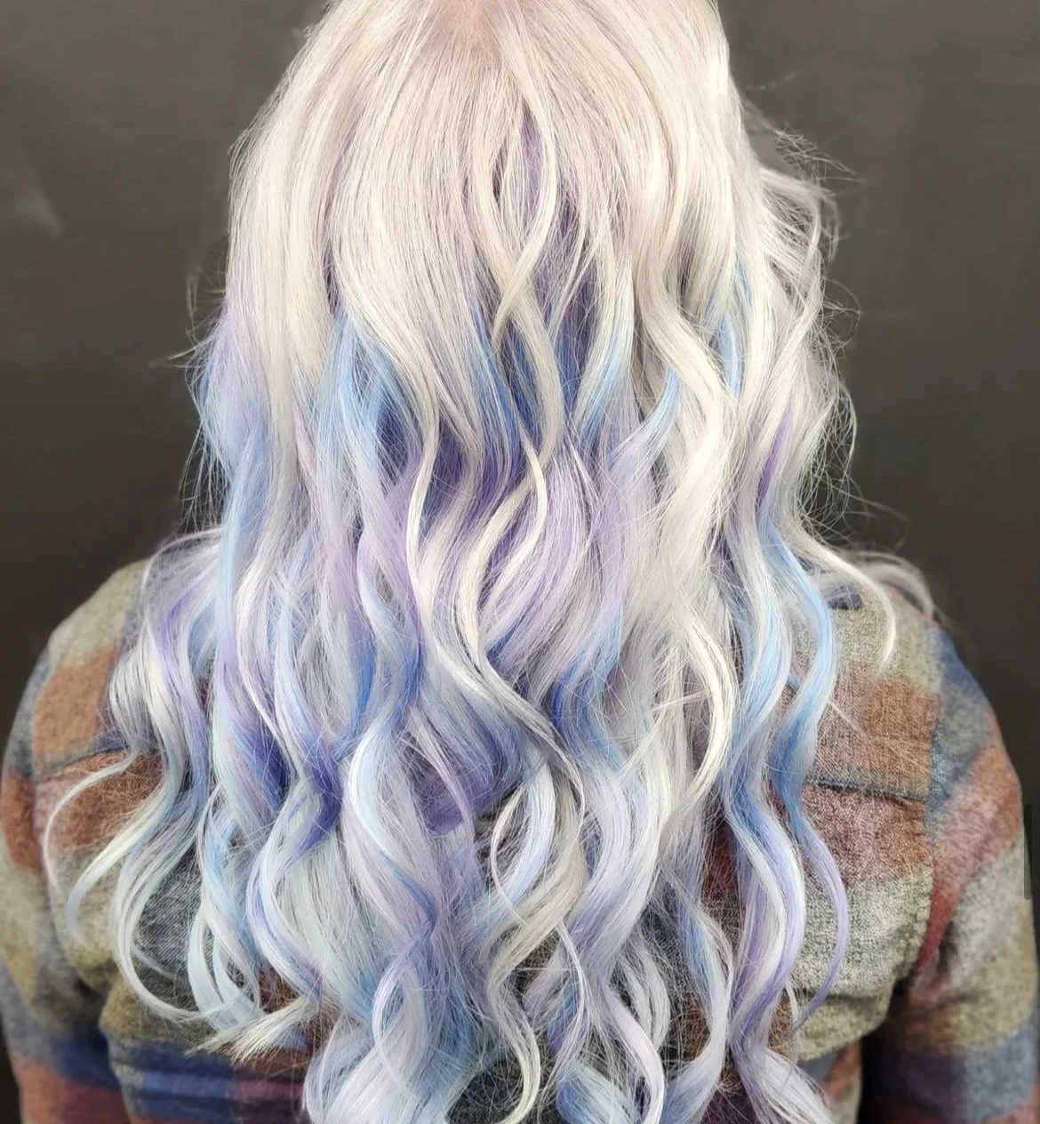 Long wavy hair with pastel blue and lilac tones