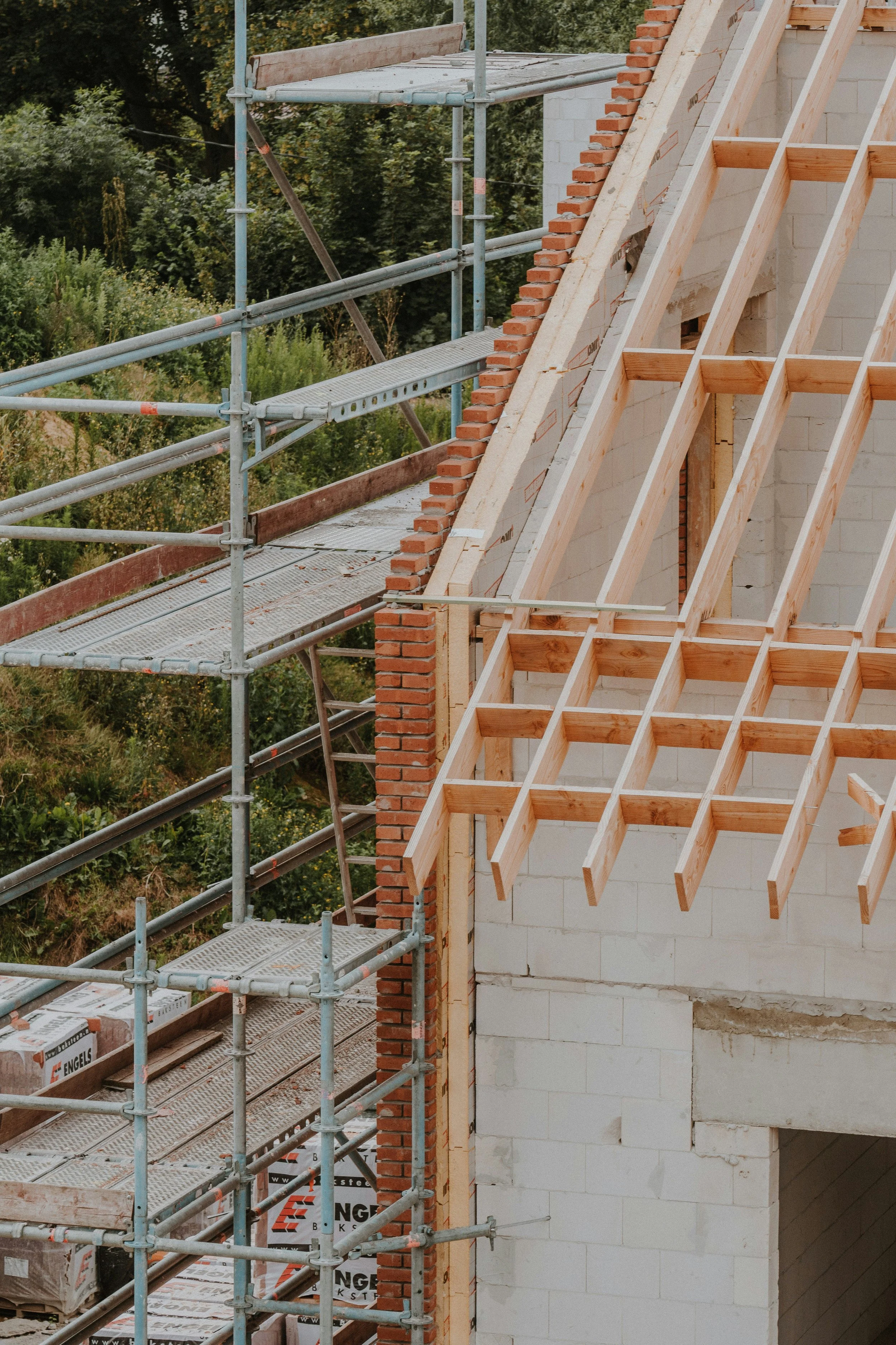 House raising in Lismore NSW using hydraulic jacks and steel beams for flood protection