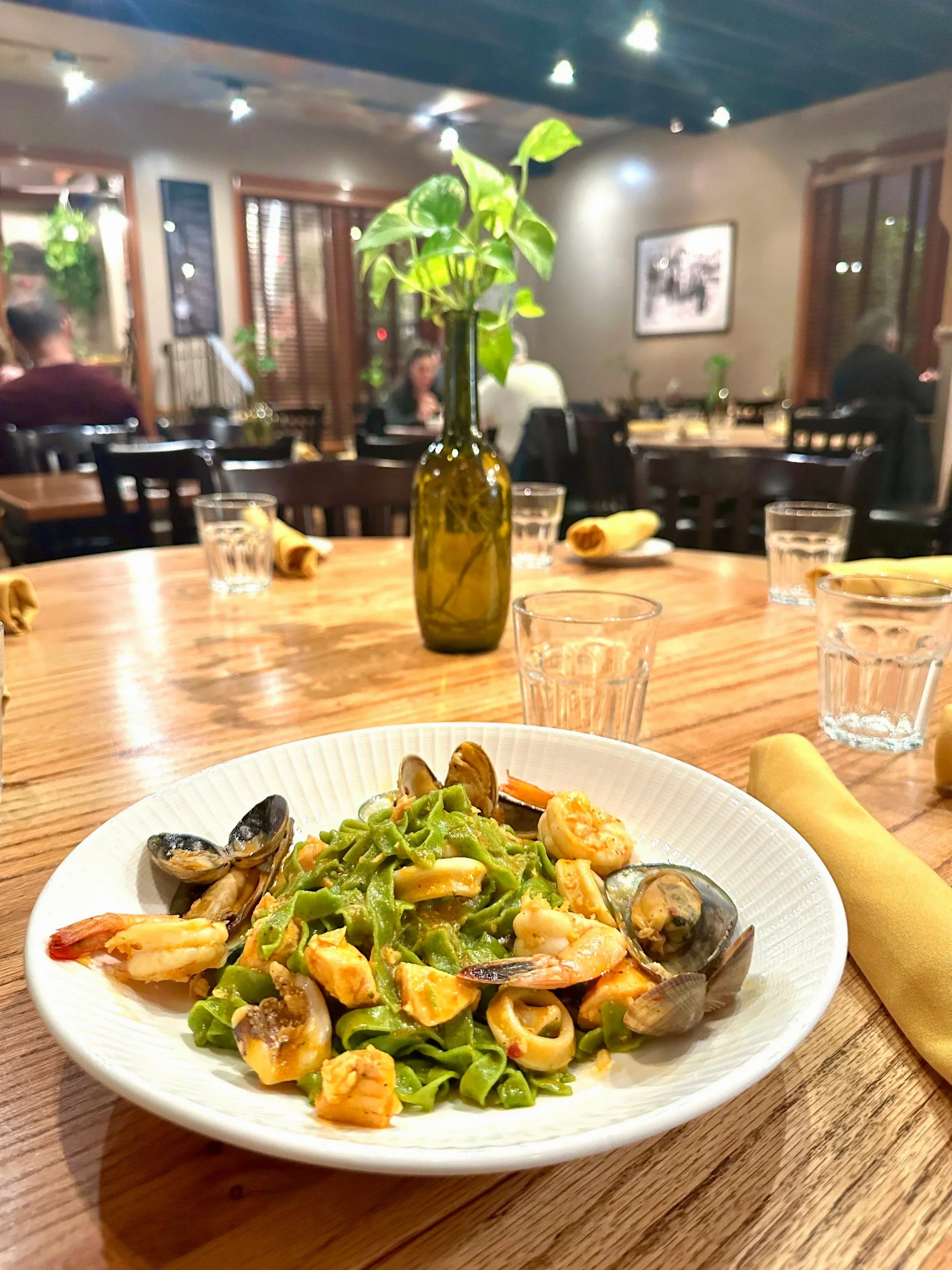 divina cucina homemade seafood pasta fettuccini with shrimp, mussels, fish, and homemade sauce