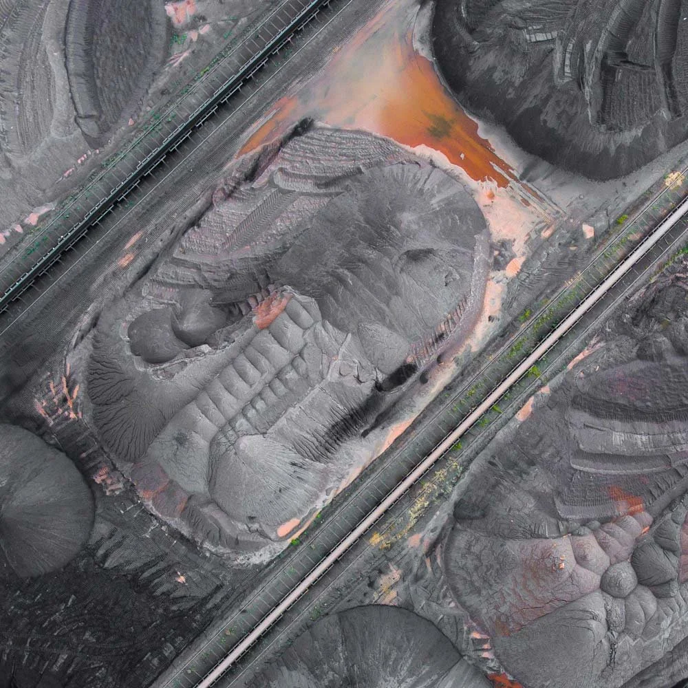 Aerial mapping of stockpile volumes at a mine site