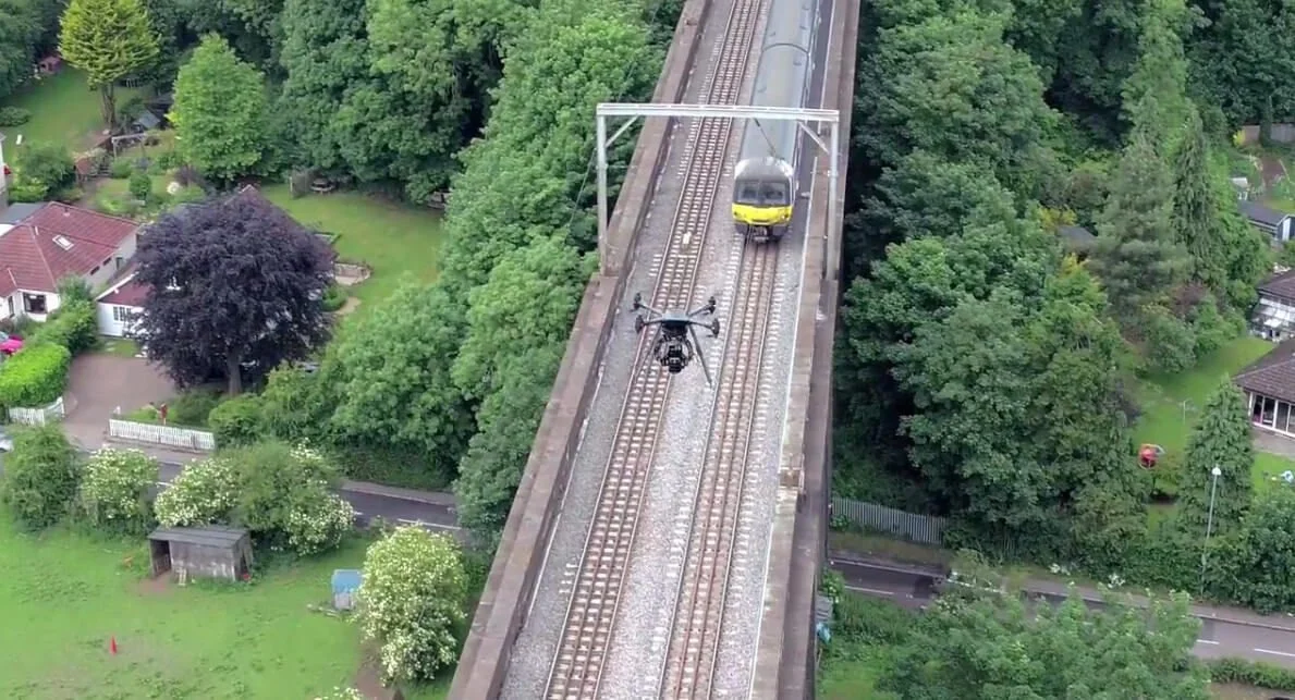 Drone flying above a rail corridor