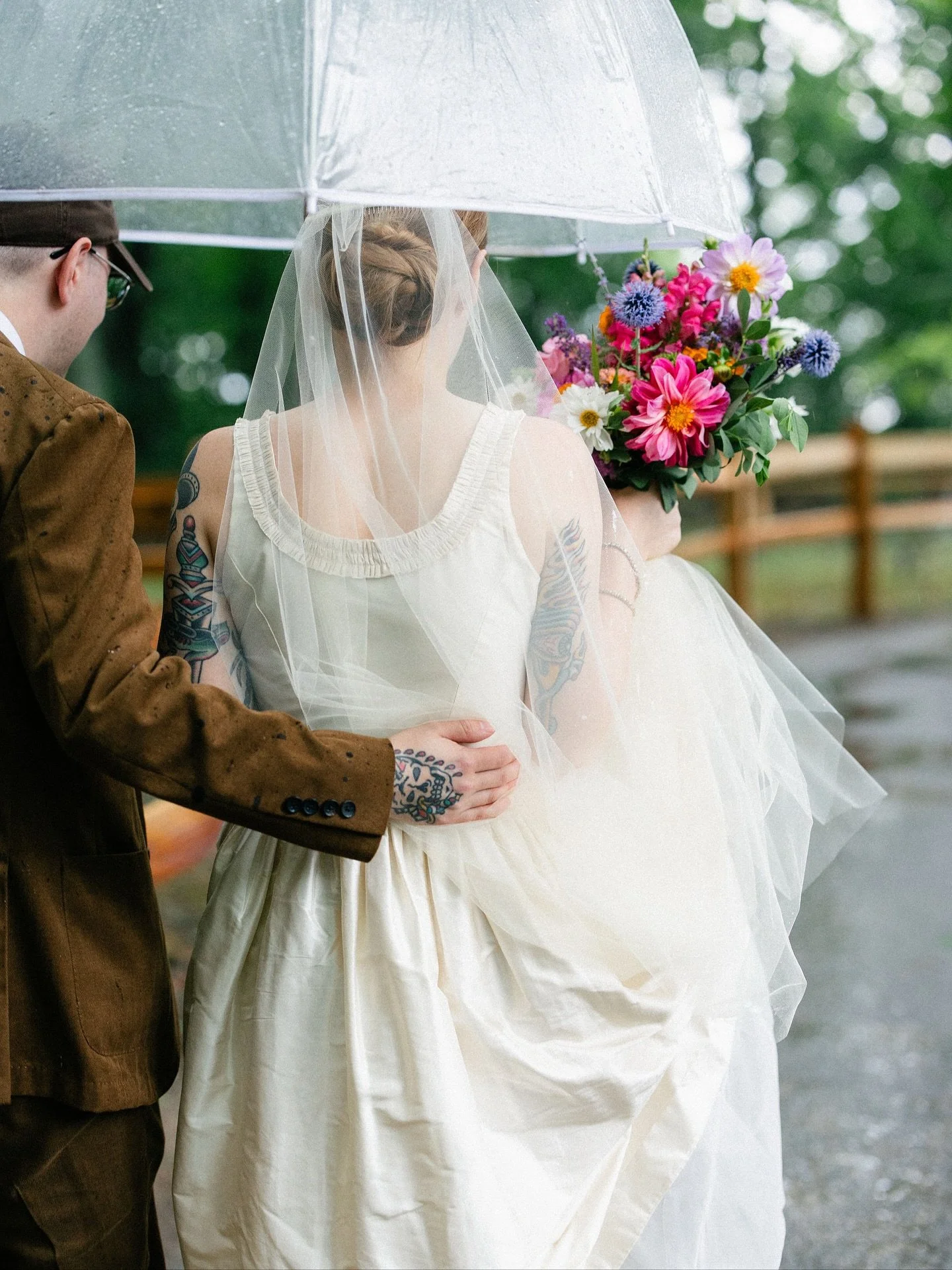 Rainy days got us thinking about Lily &amp; Eric&rsquo;s delightful, but rainy, celebration this past August. We love when our couples lean into the elements - it honestly turns into some of the most amazing photos and memories! 

Their bright floral