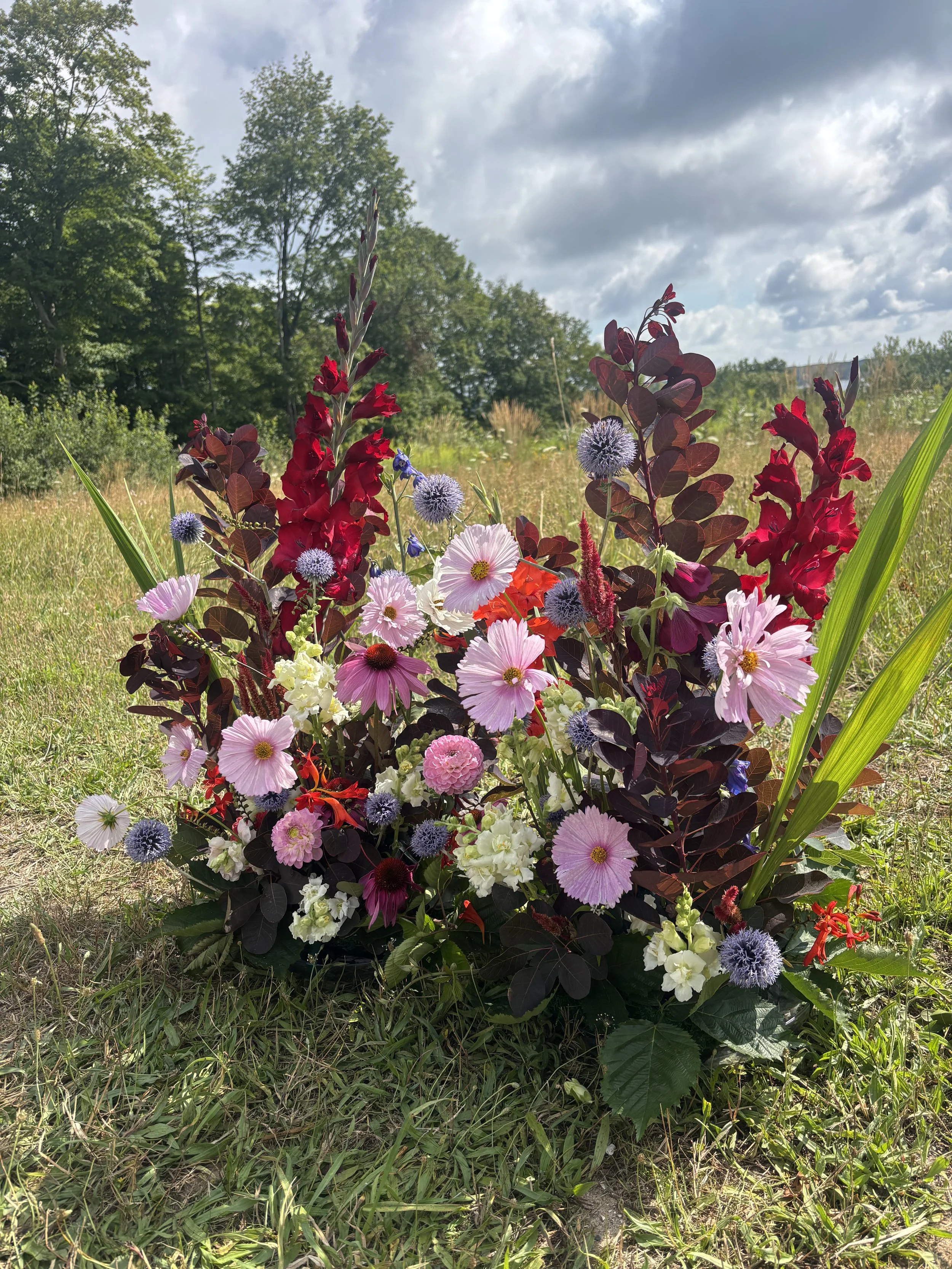 colorful-seasonal-wedding-aisle-flowers.jpg