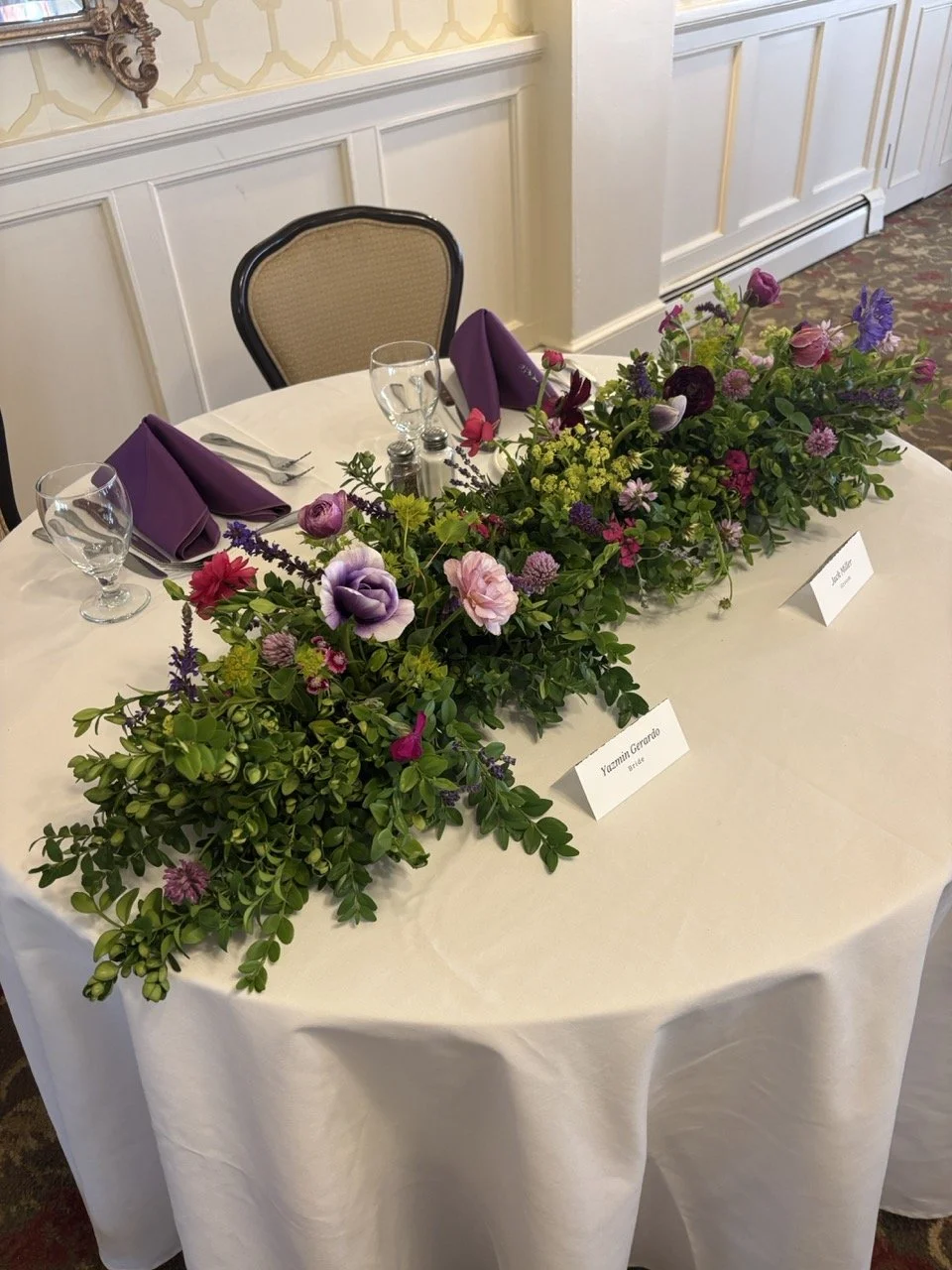 colorful-seasonal-wedding-sweetheart-table-flowers.jpg