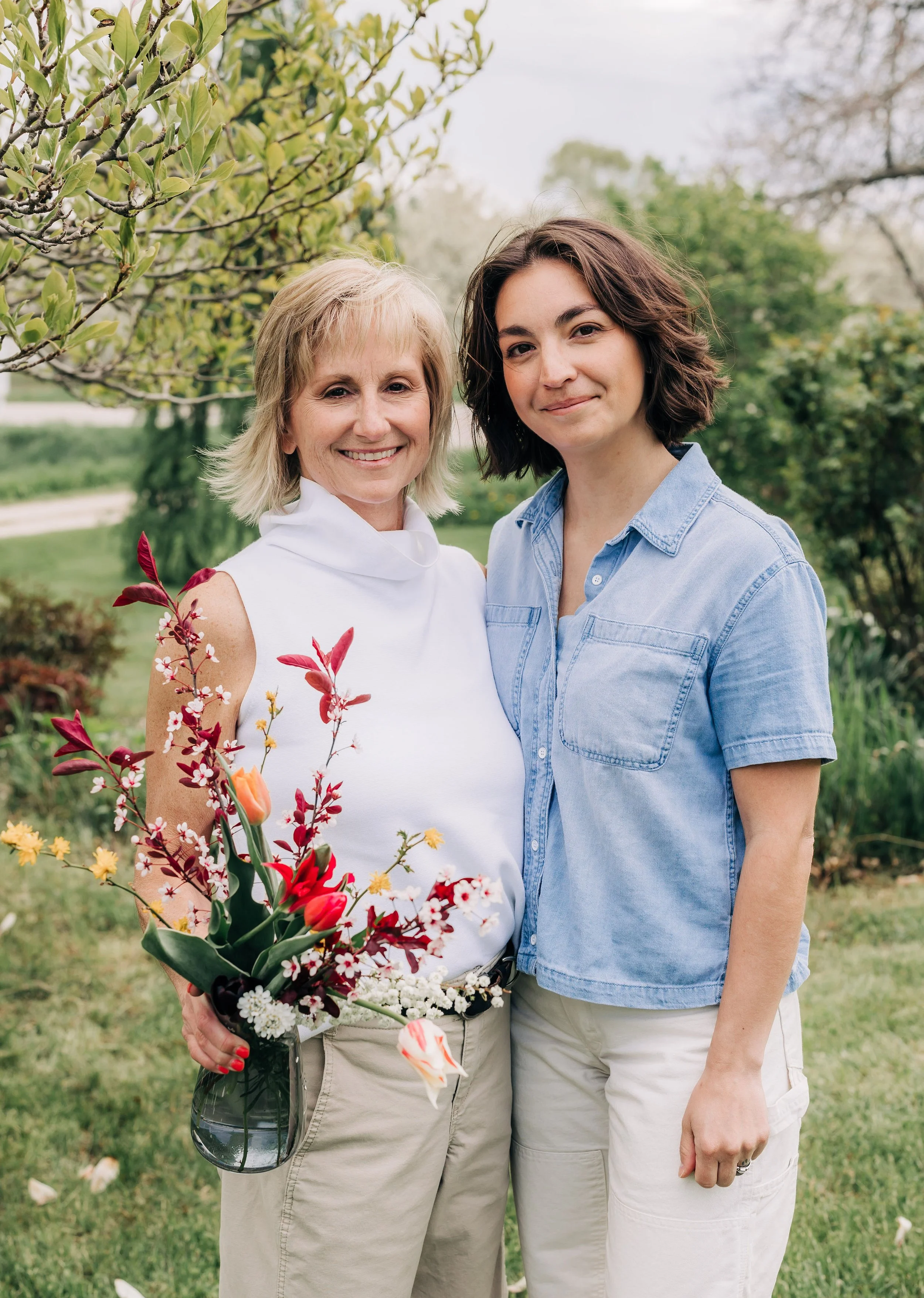 Close up vase arrangement with humans again.jpg