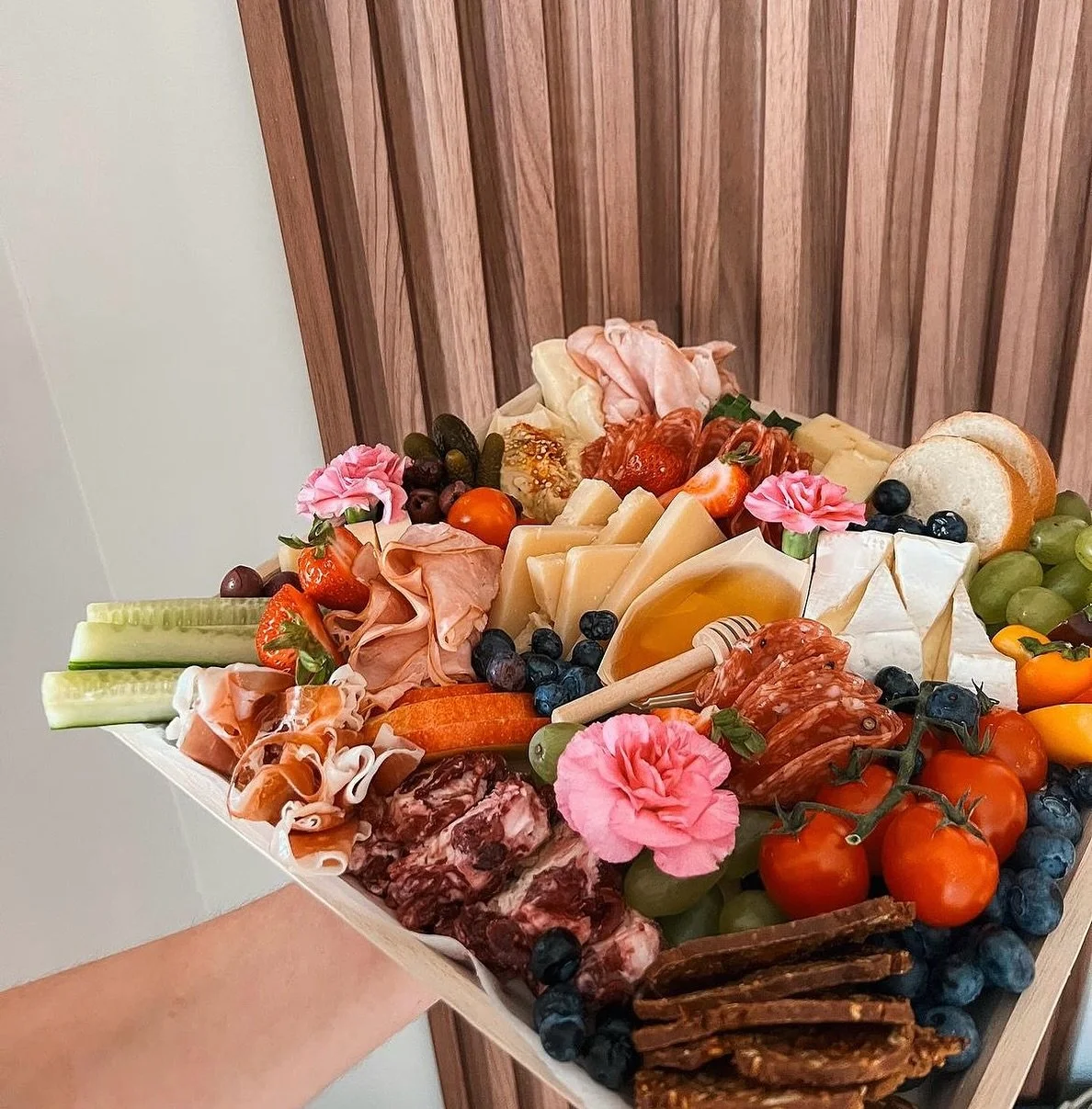 When our client wanted to surprise her best friend in the most thoughtful way, she knew just the thing&mdash;a stunning grazing board filled with all her bestie&rsquo;s favorites. Loaded with cheeses, savory meats, fresh fruits, and crunchy crackers.