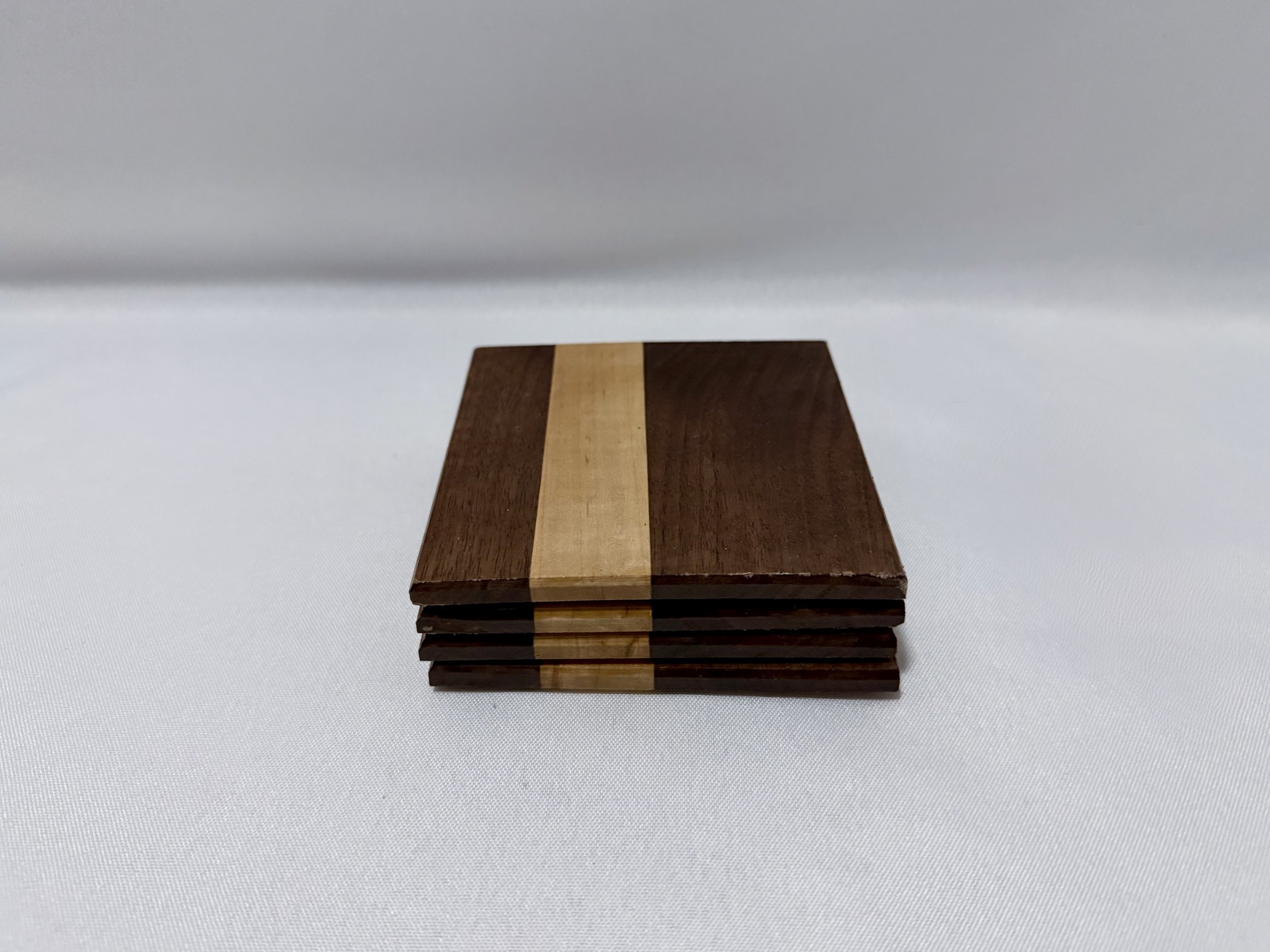 Set of Four Walnut and Maple Coasters