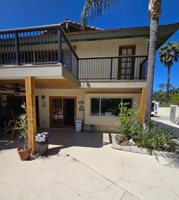 Second-story composite deck designed with structural framing, railing integration, and under-deck finishing to improve outdoor usability and long-term performance.