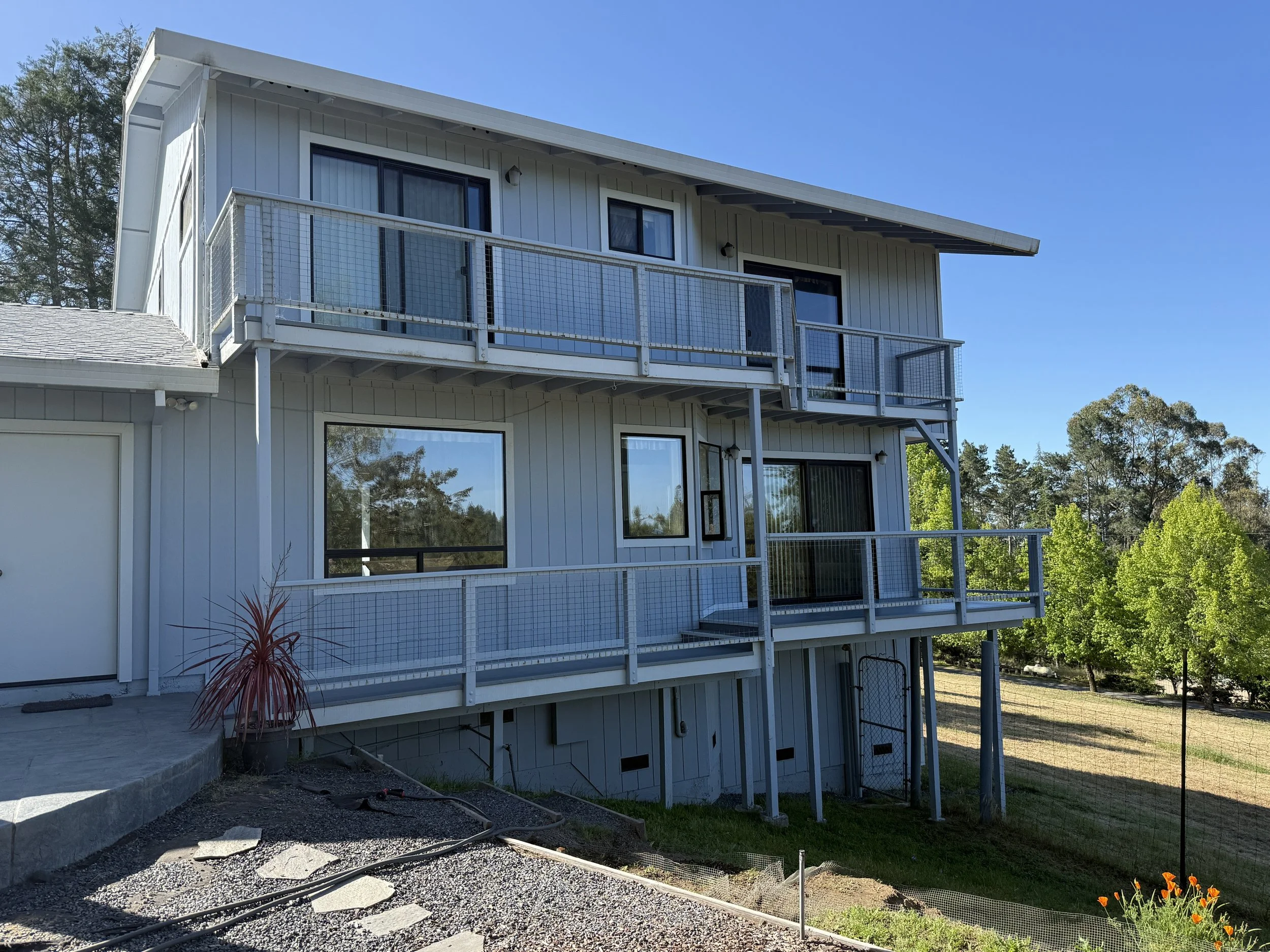 Custom deck remodeling project replacing aging structure with modern framing, upgraded decking materials, and improved outdoor living layout.