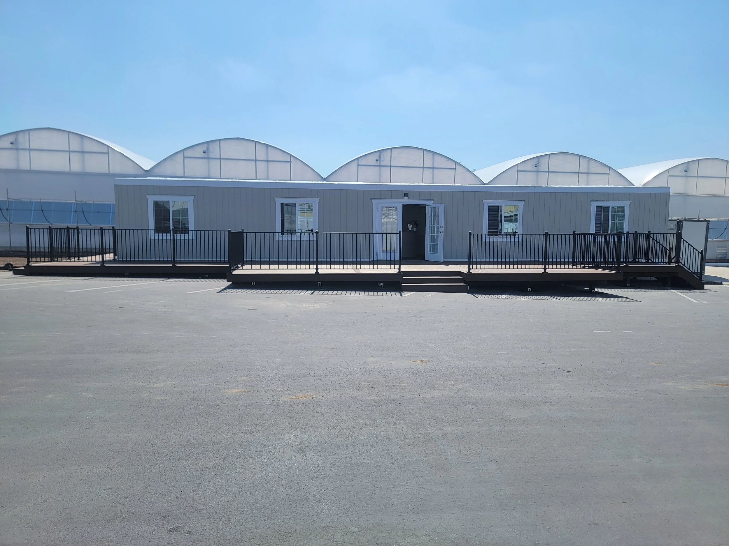 Outdoor deck featuring powder coated aluminum railing designed for modern safety integration and long-term durability.