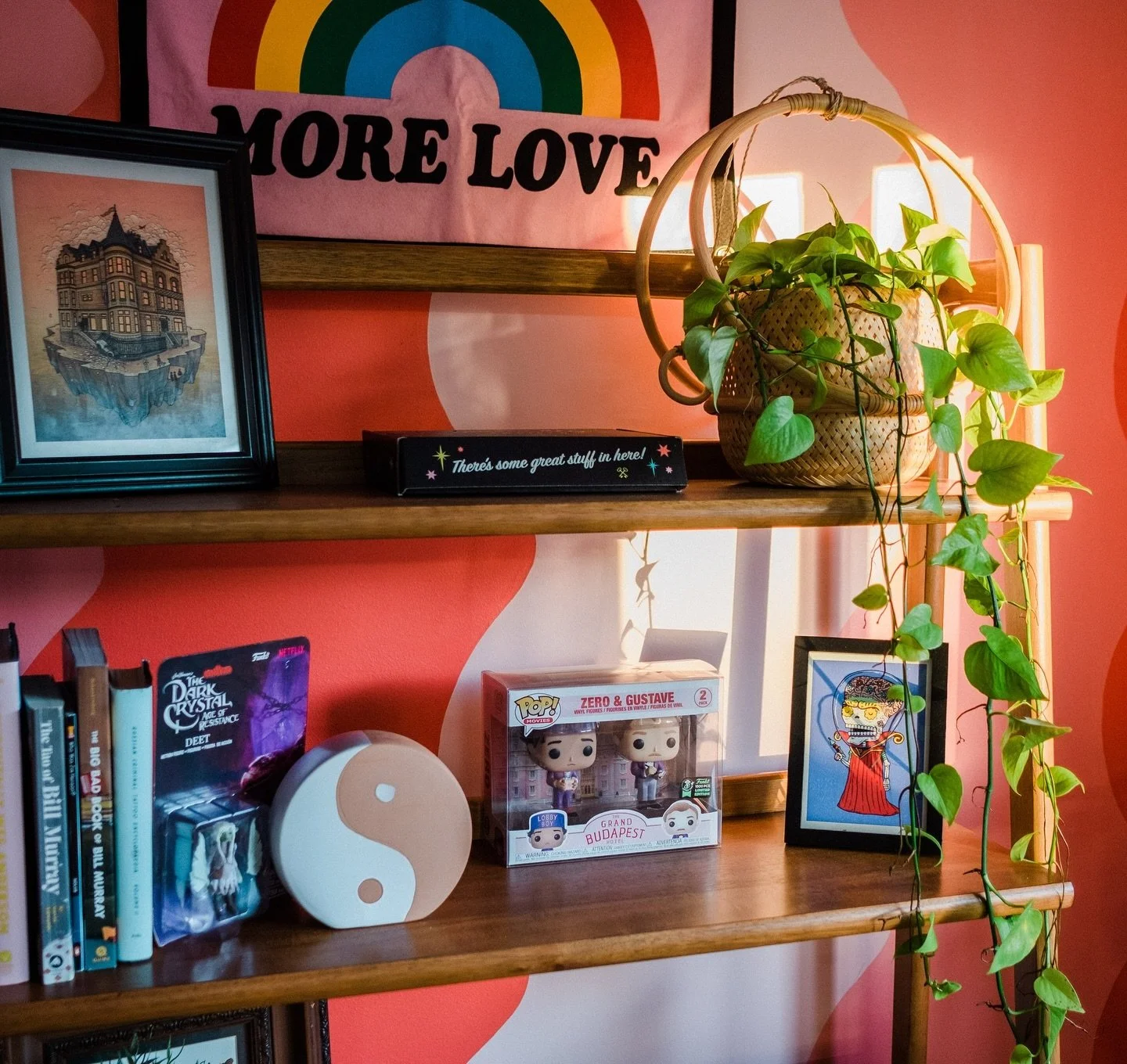 I love designing spaces as unique as the people who inhabit them! 

Here&rsquo;s a cozy nook in one of our design offices. We hand painted the pattern on the walls and arranged all the tchotchkes, books and found a nice plant friend perfect for the n