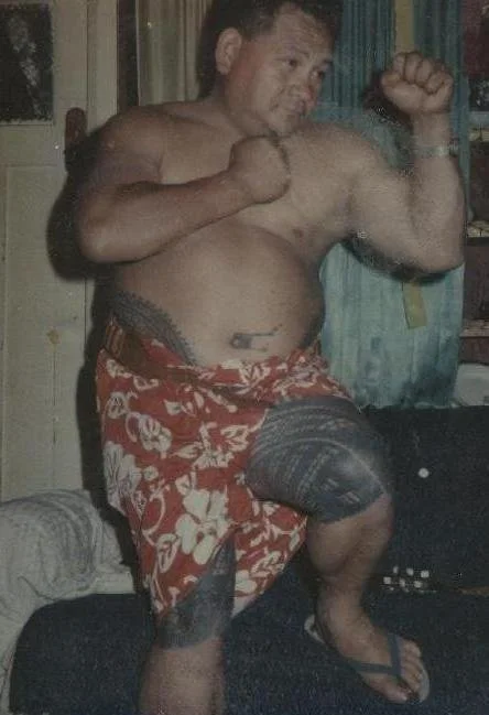 Samoan man with traditional leg tattoo, pe'a