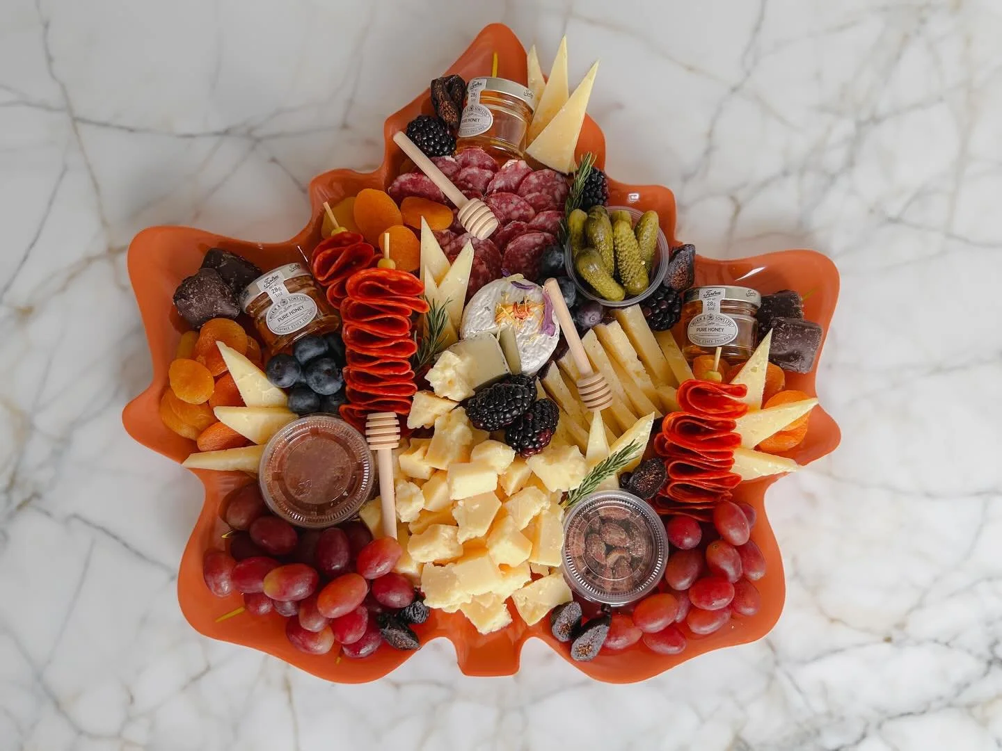 Still need a Thanksgiving spread? Pre-order our new Harvest Graze - a leaf-shaped platter for six, made with Triple Creme, cave-aged clothbound cheddar &amp; Syrah-soaked Manchego.

Order online by Nov. 26 at 6pm and pick up Thanksgiving Day between 