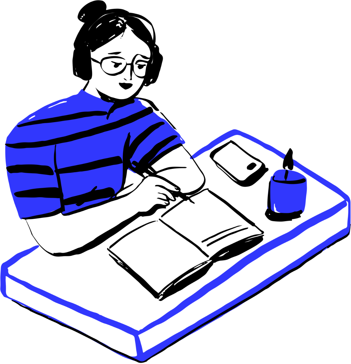 A person wearing a striped shirt sitting at a table journaling.