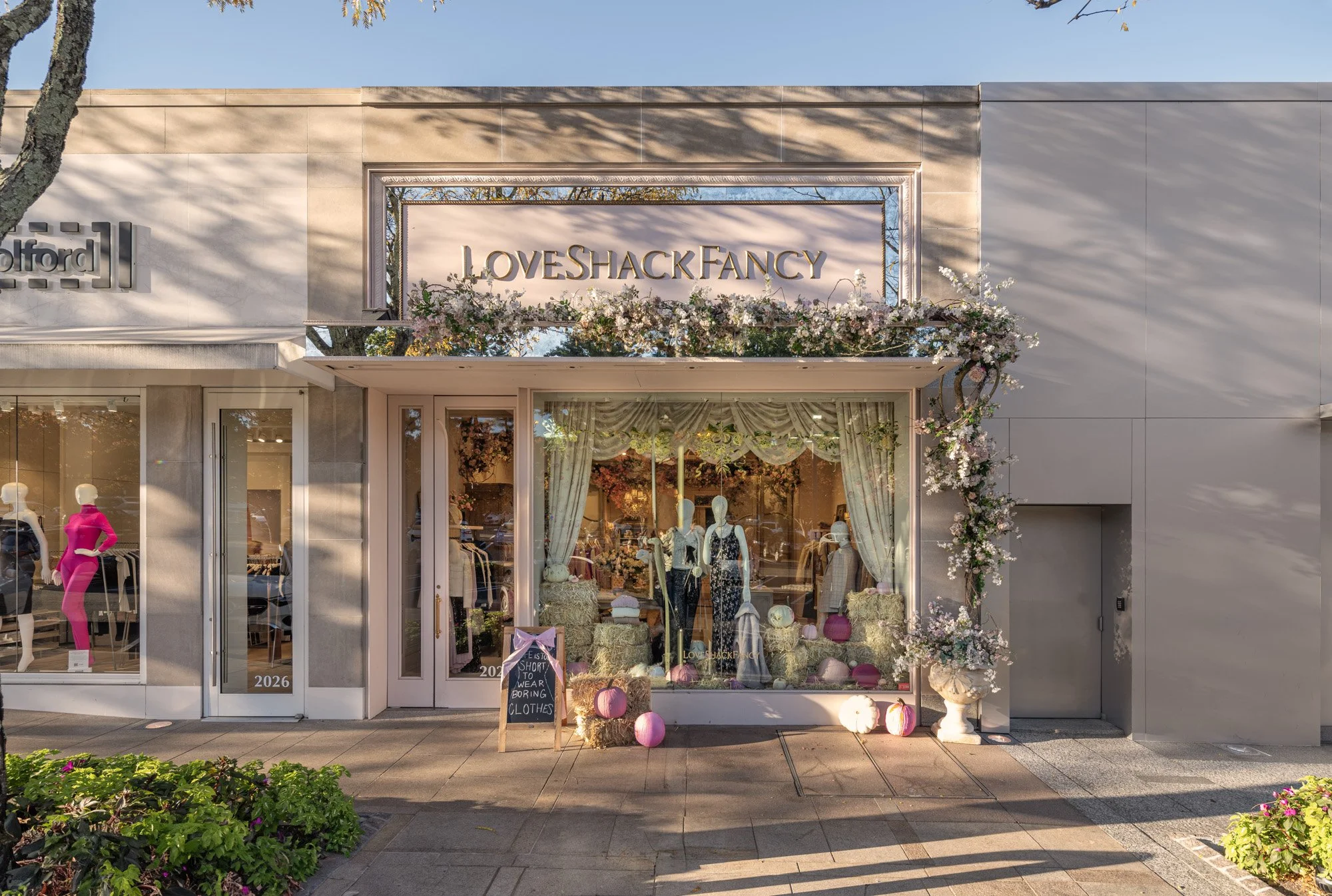 Luxury storefront facades at Americana Manhasset including Dior, David Yurman, Ralph Lauren, Fendi, Lafayette 148, Scanlan Theodore, LoveShackFancy and Todd Snyder — retail architectural photography across seasons by Pavel Bendov, Manhasset NY
