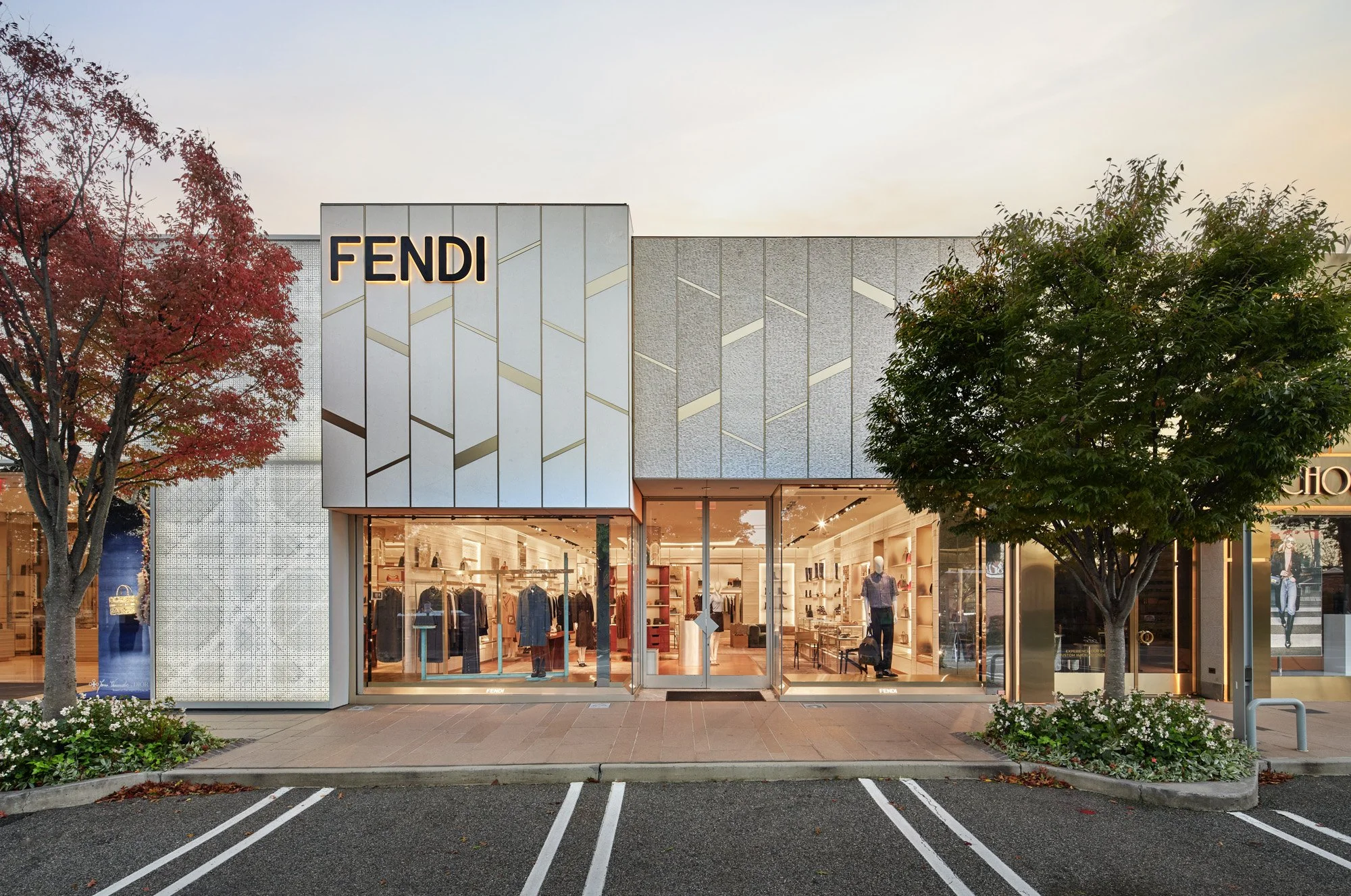 Luxury storefront facades at Americana Manhasset including Dior, David Yurman, Ralph Lauren, Fendi, Lafayette 148, Scanlan Theodore, LoveShackFancy and Todd Snyder — retail architectural photography across seasons by Pavel Bendov, Manhasset NY