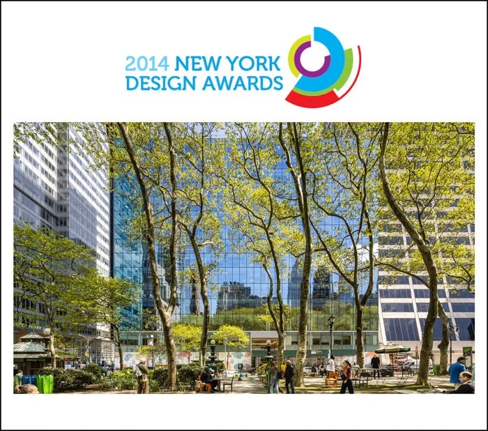 Nighttime city scene in New York with lit office buildings and a small kiosk in the foreground. Overlay text reads 'New York Design Awards 2022, Better Future, Gold'.