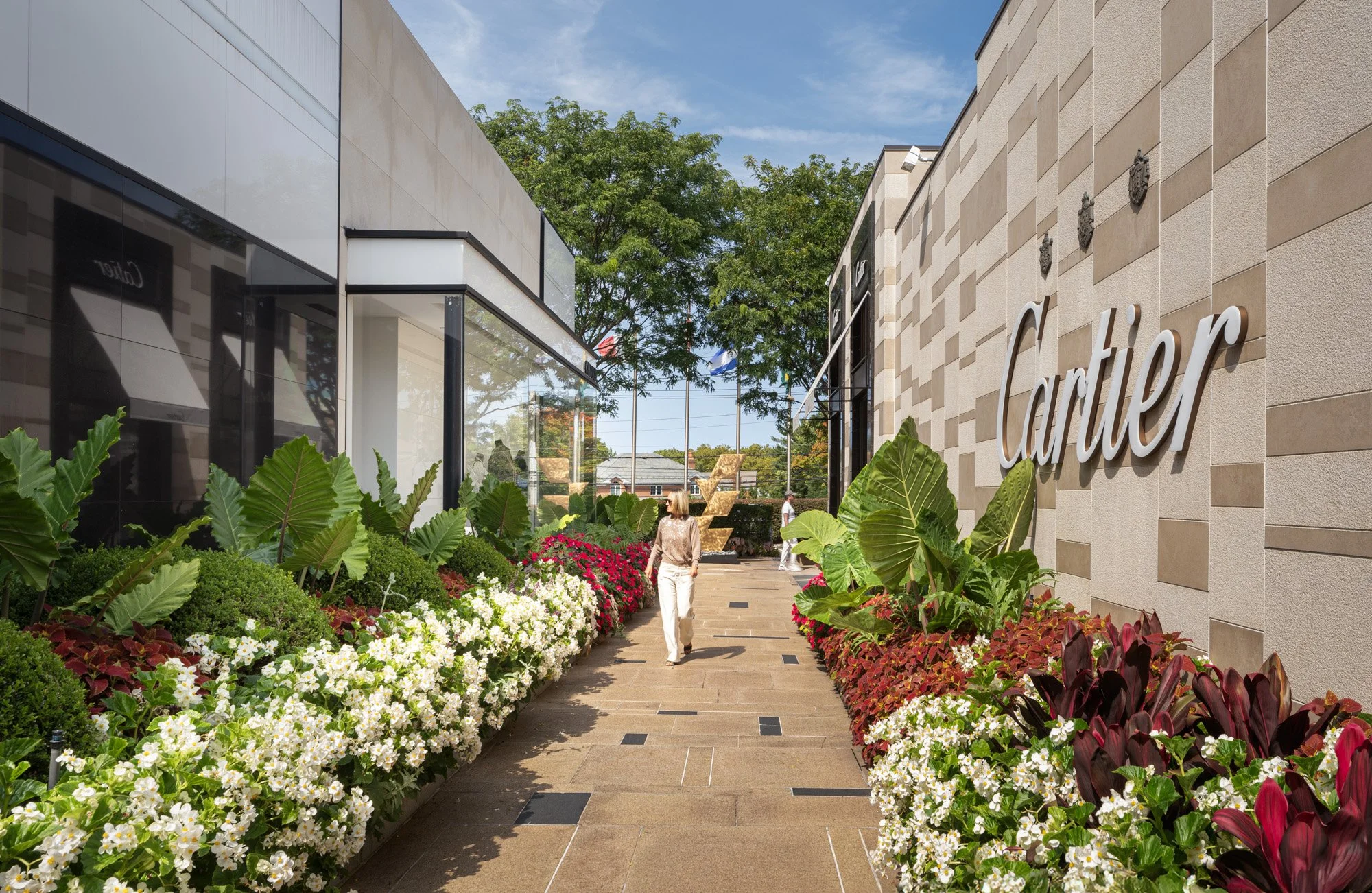Cartier storefronts at Americana Manhasset with red autumn maples, luxury retail exterior photography, Manhasset NY — Pavel Bendov Photography