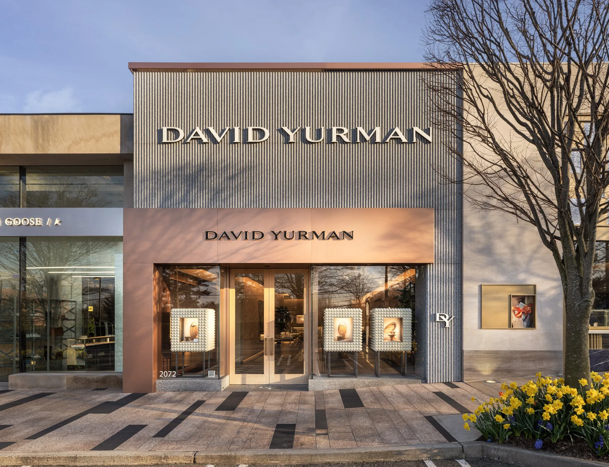 Luxury storefront facades at Americana Manhasset including Dior, David Yurman, Ralph Lauren, Fendi, Lafayette 148, Scanlan Theodore, LoveShackFancy and Todd Snyder — retail architectural photography across seasons by Pavel Bendov, Manhasset NY