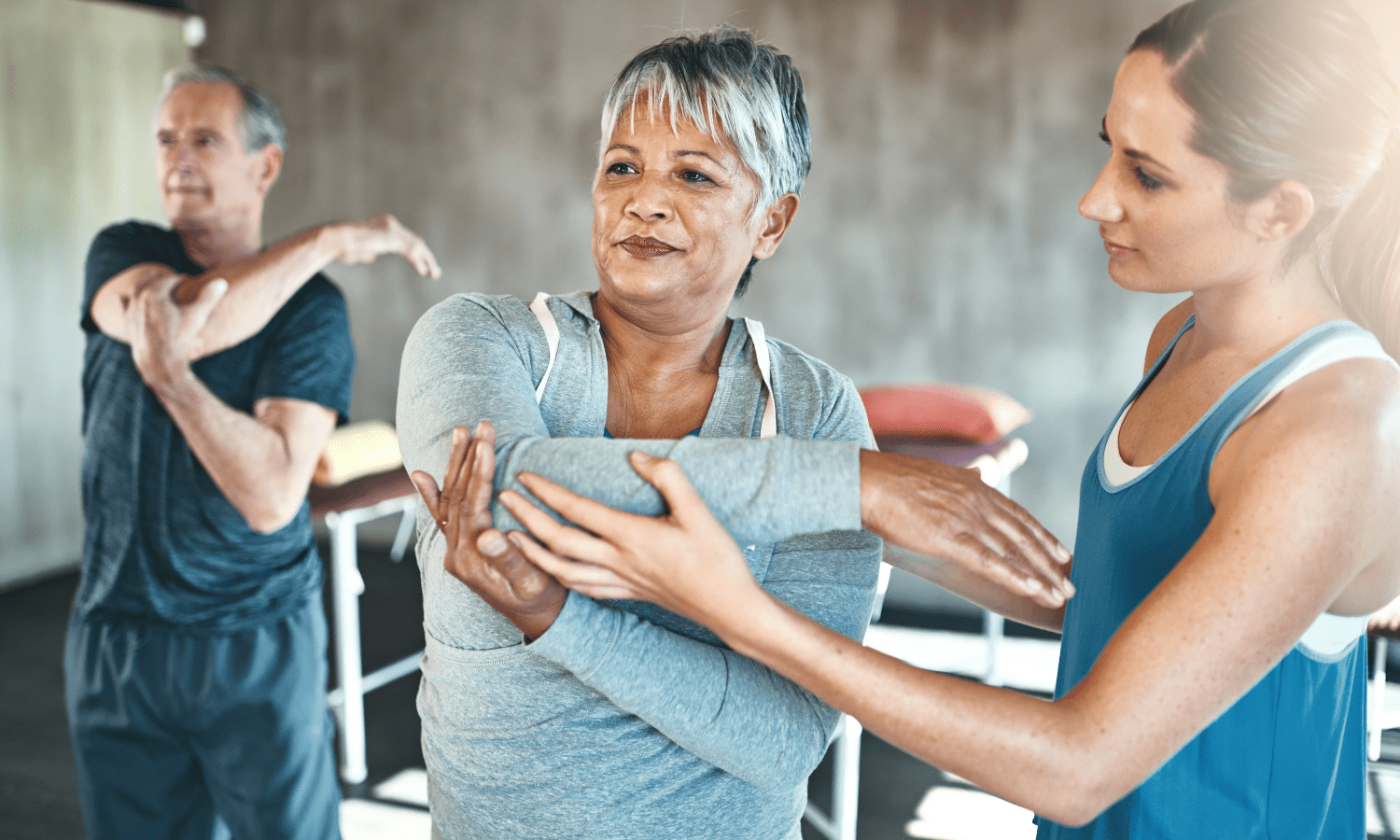 A group of older people improving vascular health through gym workouts.