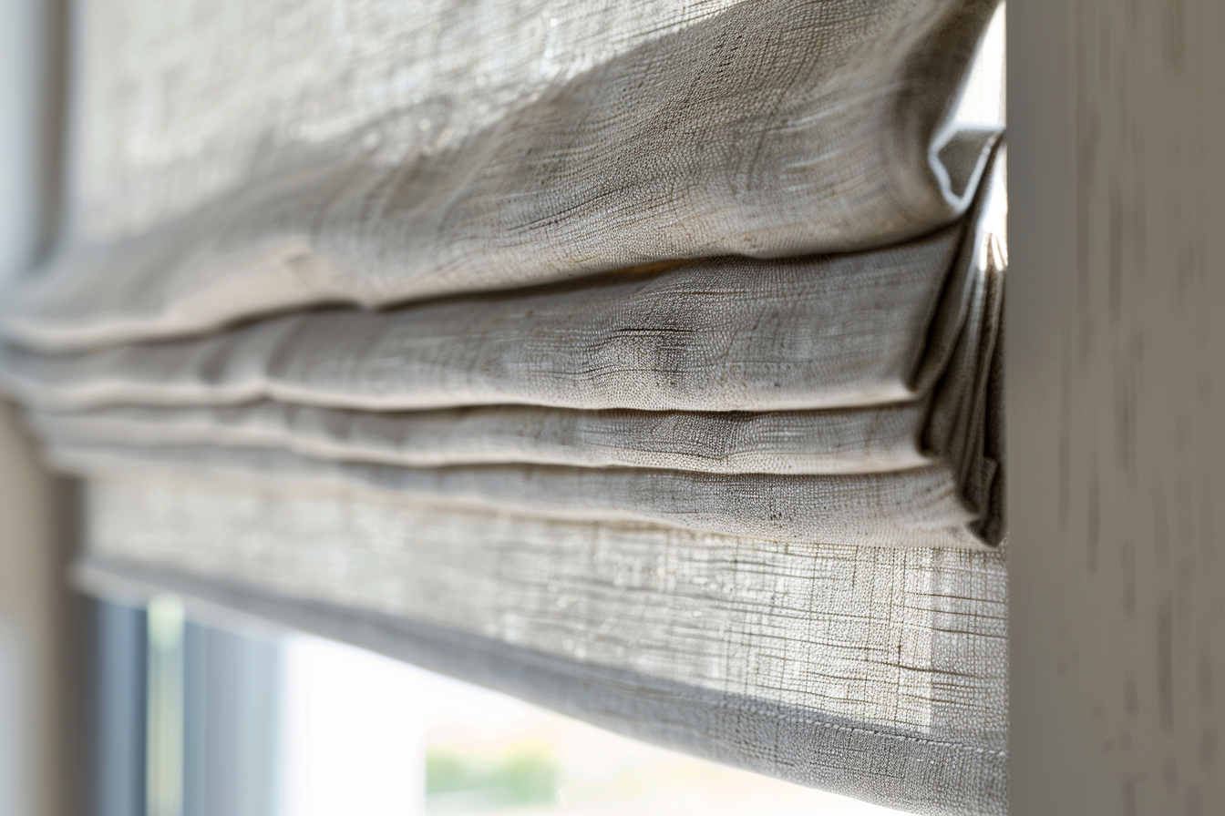 u4174536356_close-up_of_light_grey_linen_Roman_blind_with_sof_a78e8e49-6876-43b6-88b9-a901f88acd78_3.png