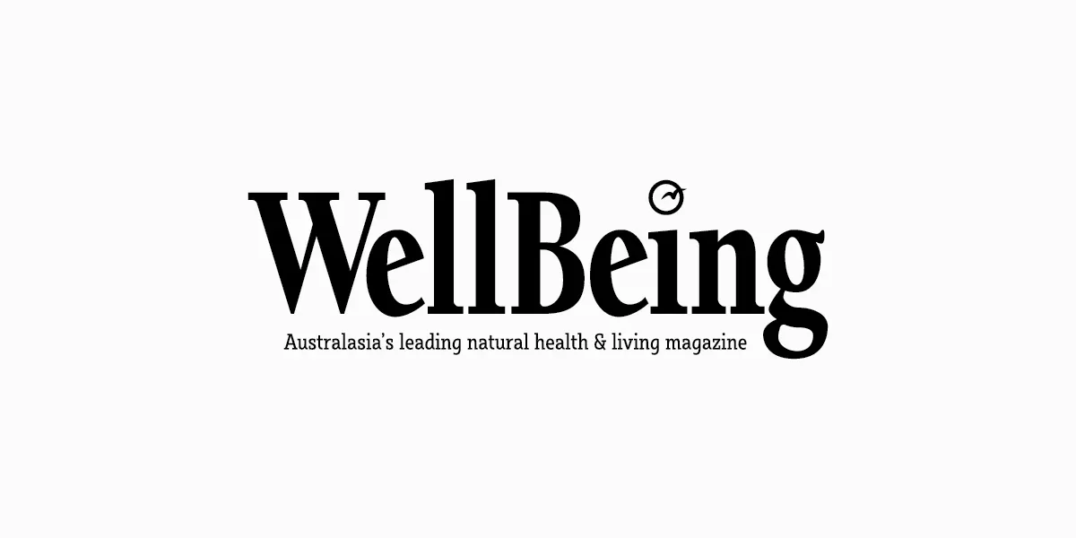 Magazine cover with the title "WellBeing" and subtitle "Australasia's leading natural health & living magazine" on a white background.