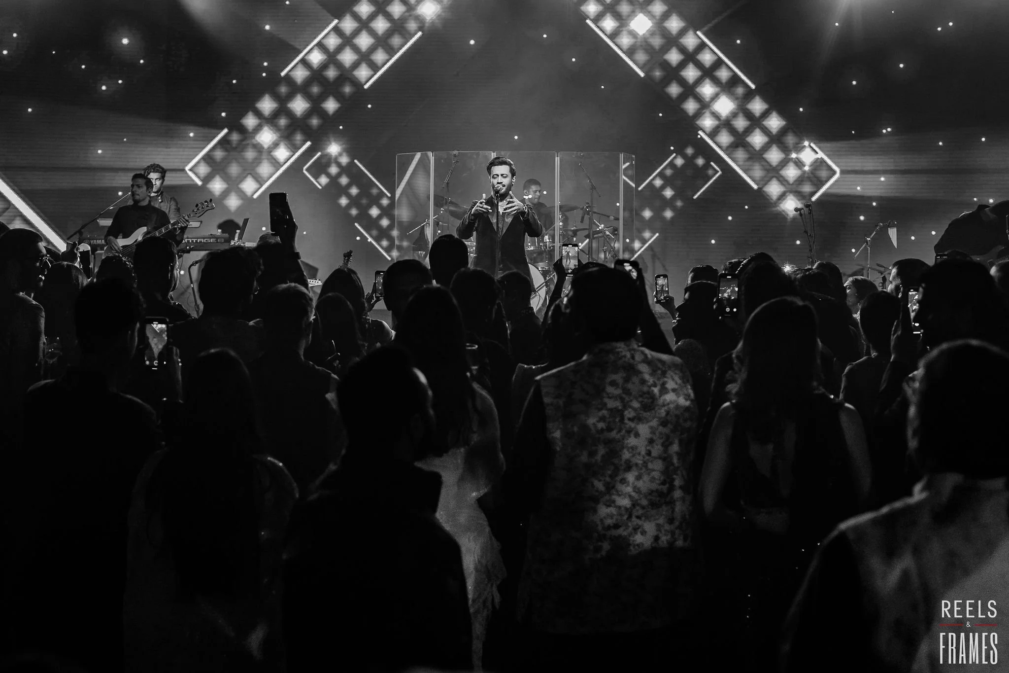 Atif Aslam performing at a wedding