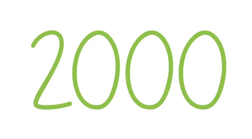 Hand-drawn green number 2000 on a white background.