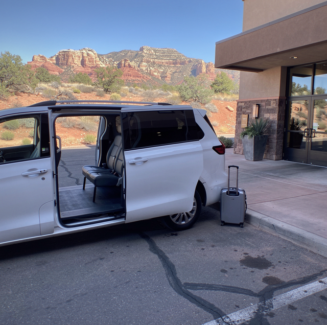 wedding shuttle van driving narrow Sedona red rock road