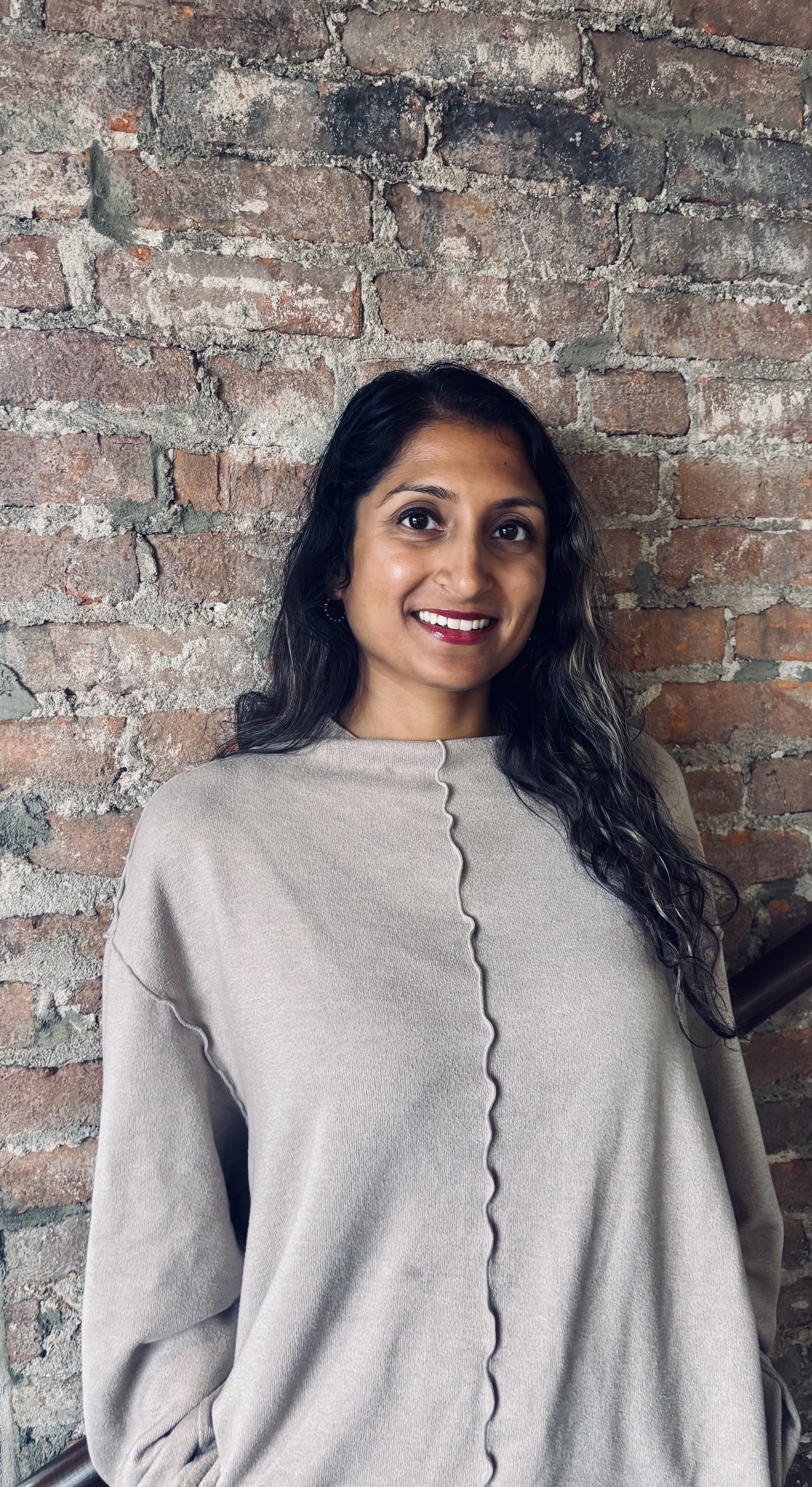 Portrait of infertility therapist in Miami, FL Dr. Marisa Perera, founder of Natal Counseling infertility, pregnancy, miscarriage, and postpartum perinatal mental healthcare.