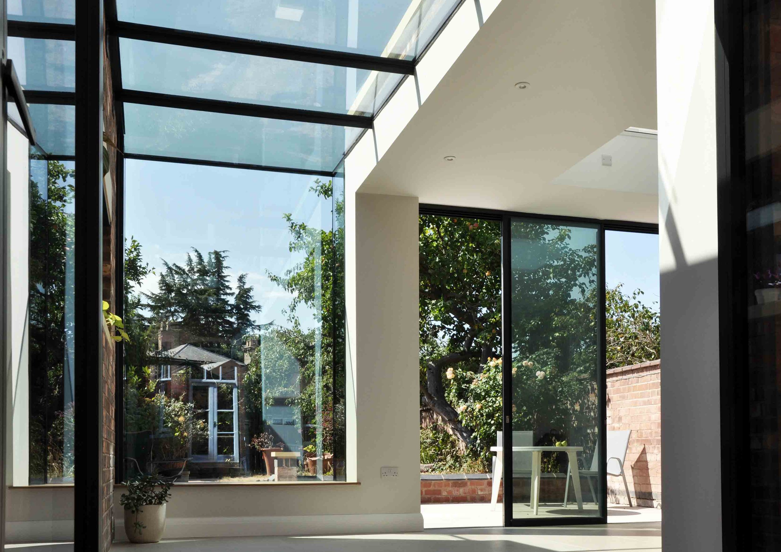 York Road completion photograph 07 showing structural glass roof integrated with cantilevered oriel glass window