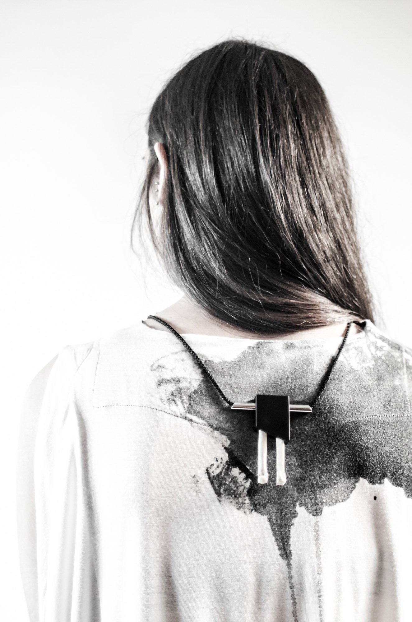 Opposites Necklace, "Gemini", Black Corian, Found Bones, Stainless Steel, Nautical Cord, 2015