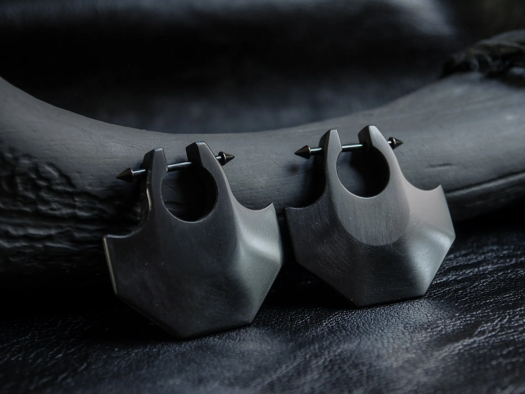 Blade earrings, Black Corian, 2016