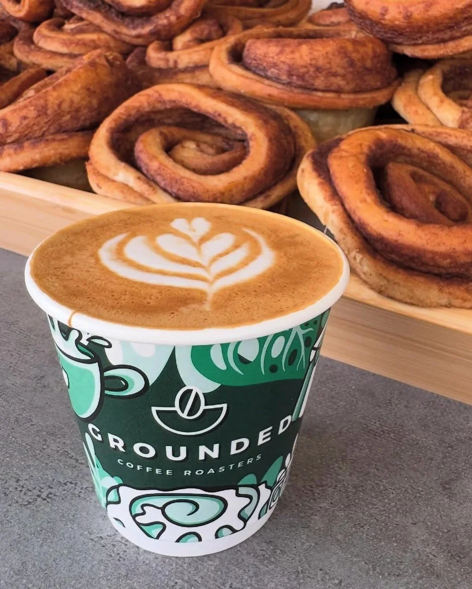 So exciting to see so many people using the newly designed @groundedcoffeeroasters cups! Been an absolute dream to see these printed up! #coffeecupdesign