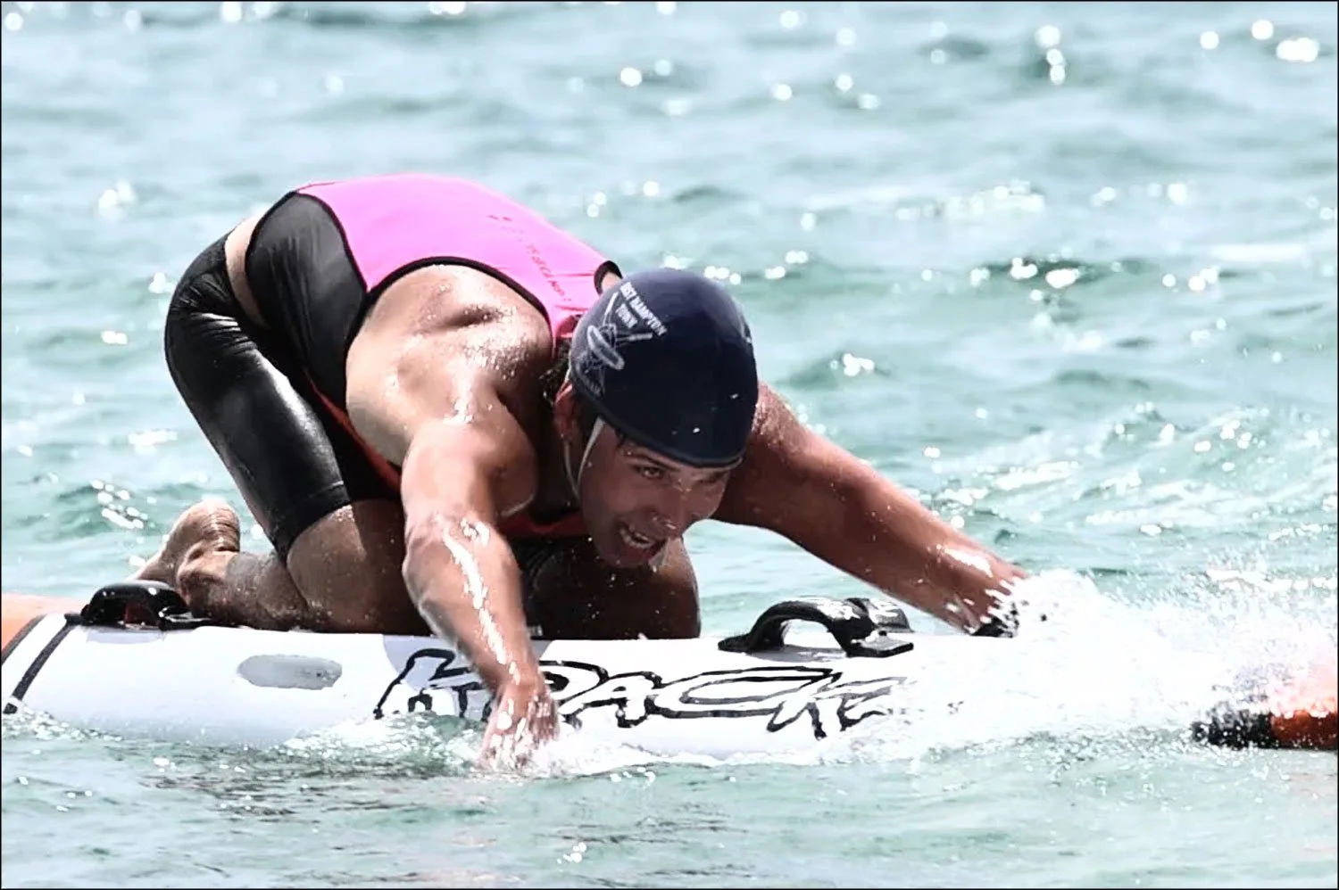 Dylan Zucker, above, won gold in the U19 male rescue race along with Drake Harper and Nico Van der Meer of the Santa Cruz Surf Lifesaving Association and Colin Stueber of Jones Beach State Park. 
