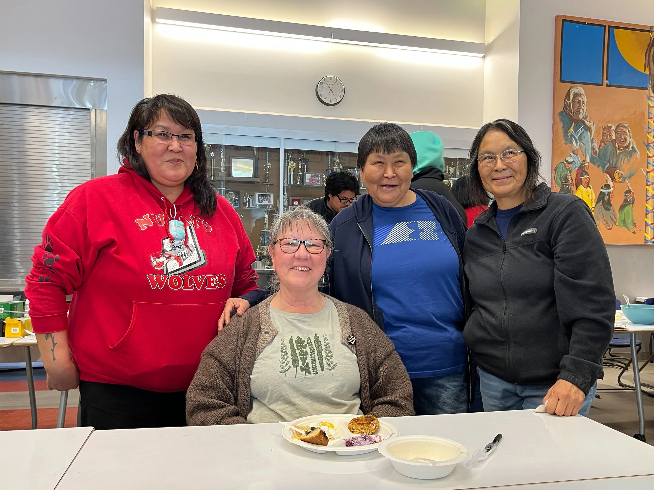 Kitty with new friends in Nulato, 2025