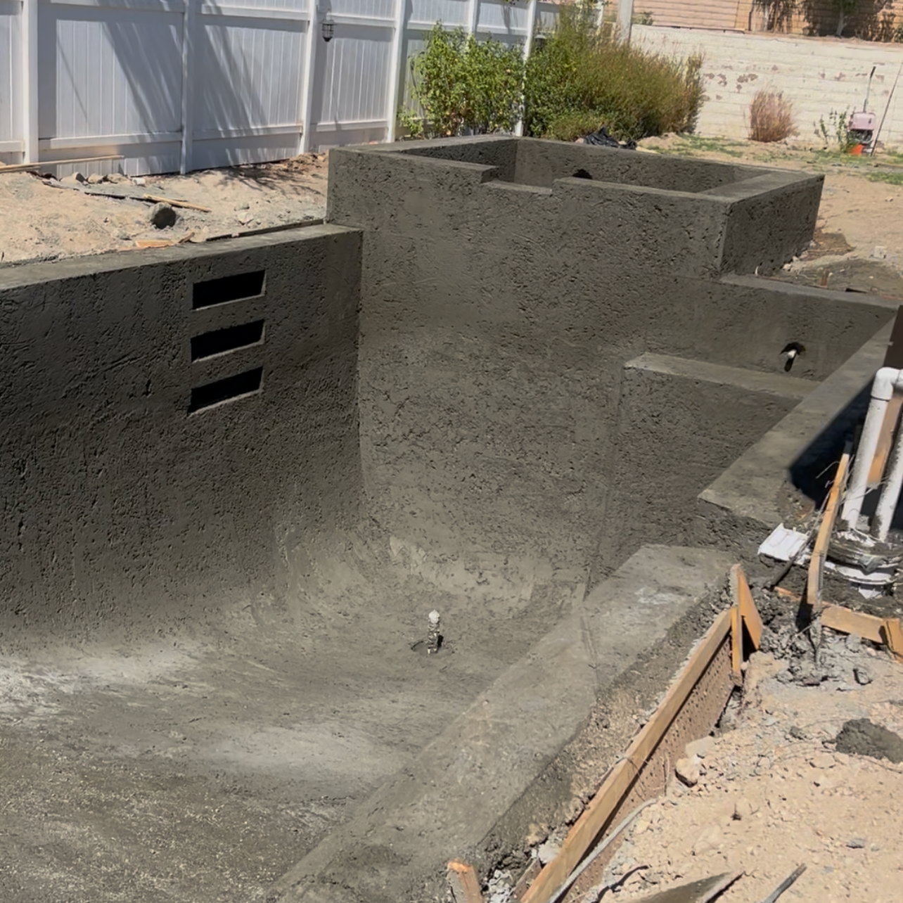 pool with raised spa and inlaid ladder