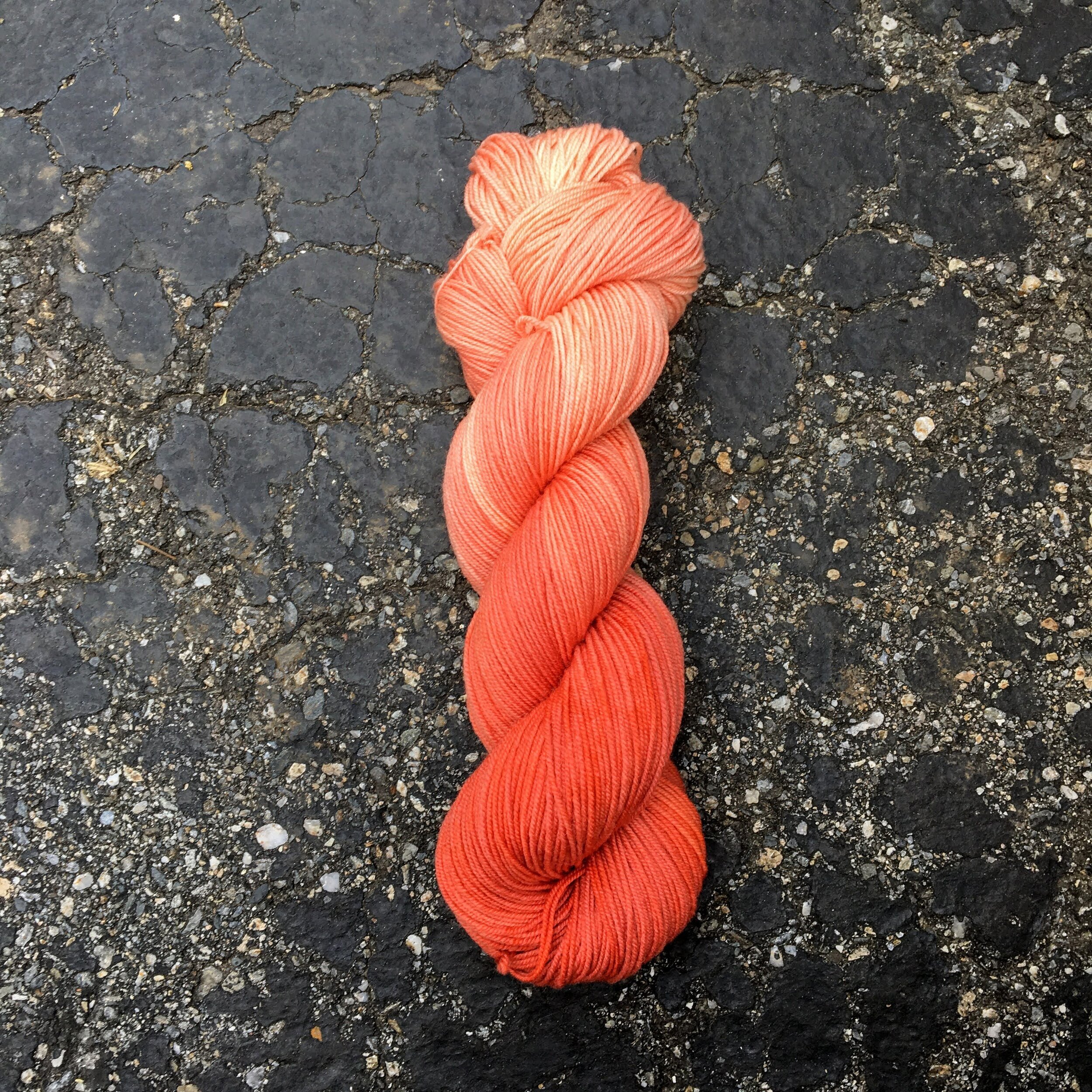 A skein of orange yarn