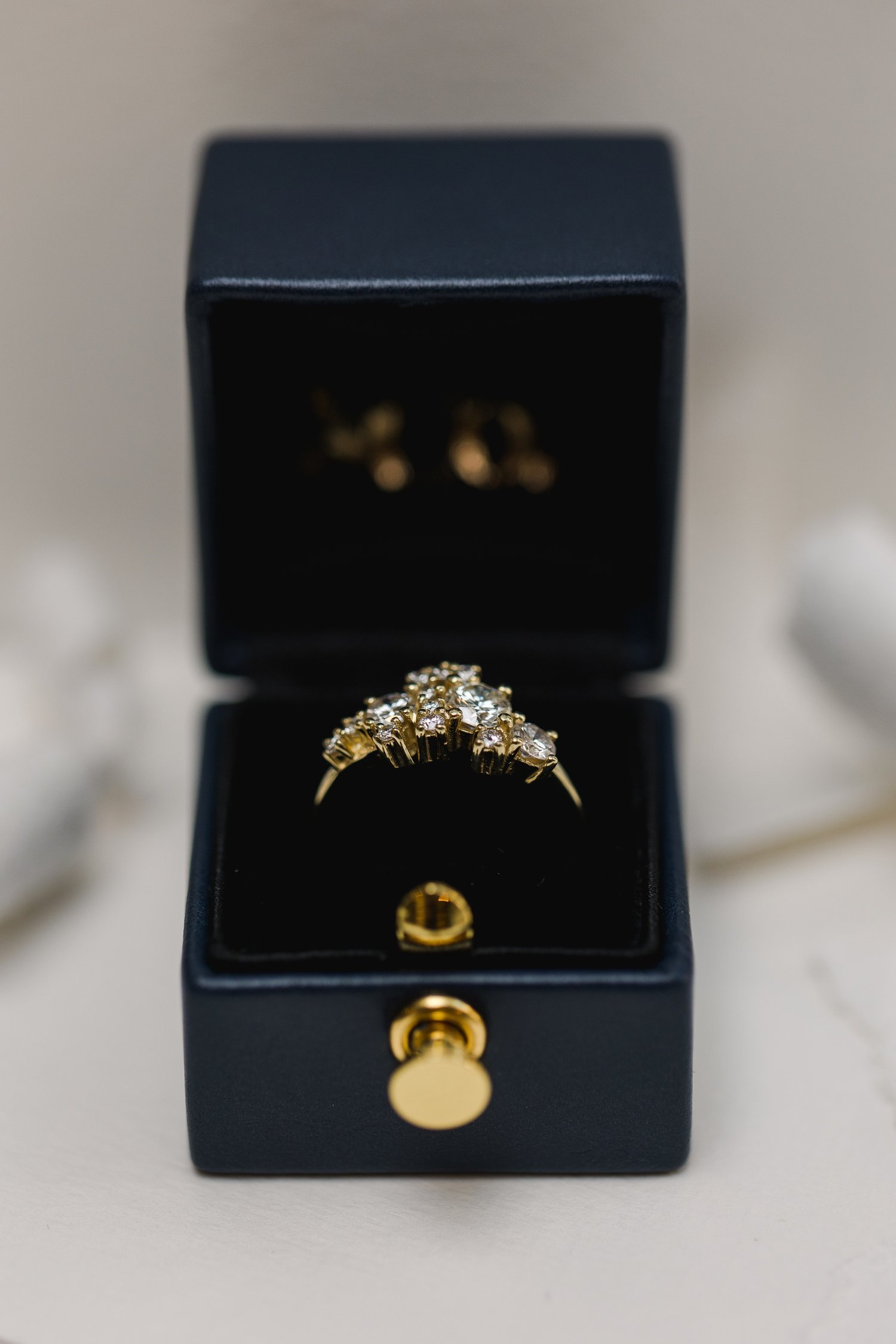 Custom made cluster style recycled diamond yellow gold engagement ring designed by Alexandria &amp; Company fine jewelers 