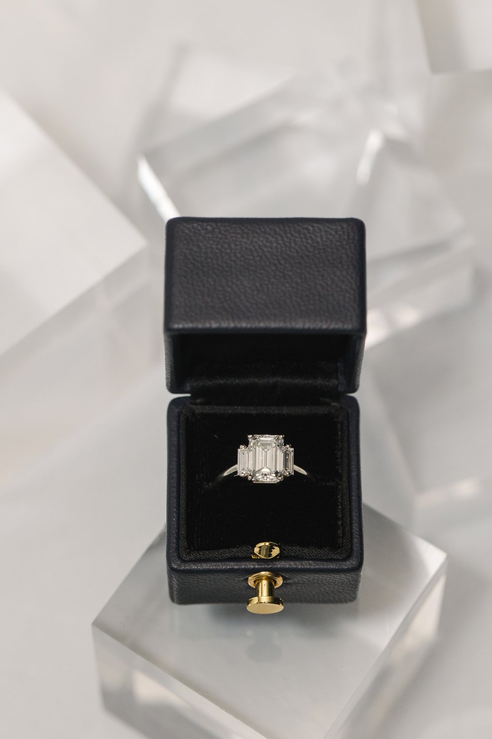 Emerald cut three stone engagement ring custom designed by Alexandria &amp; Company in Old Town Alexandria