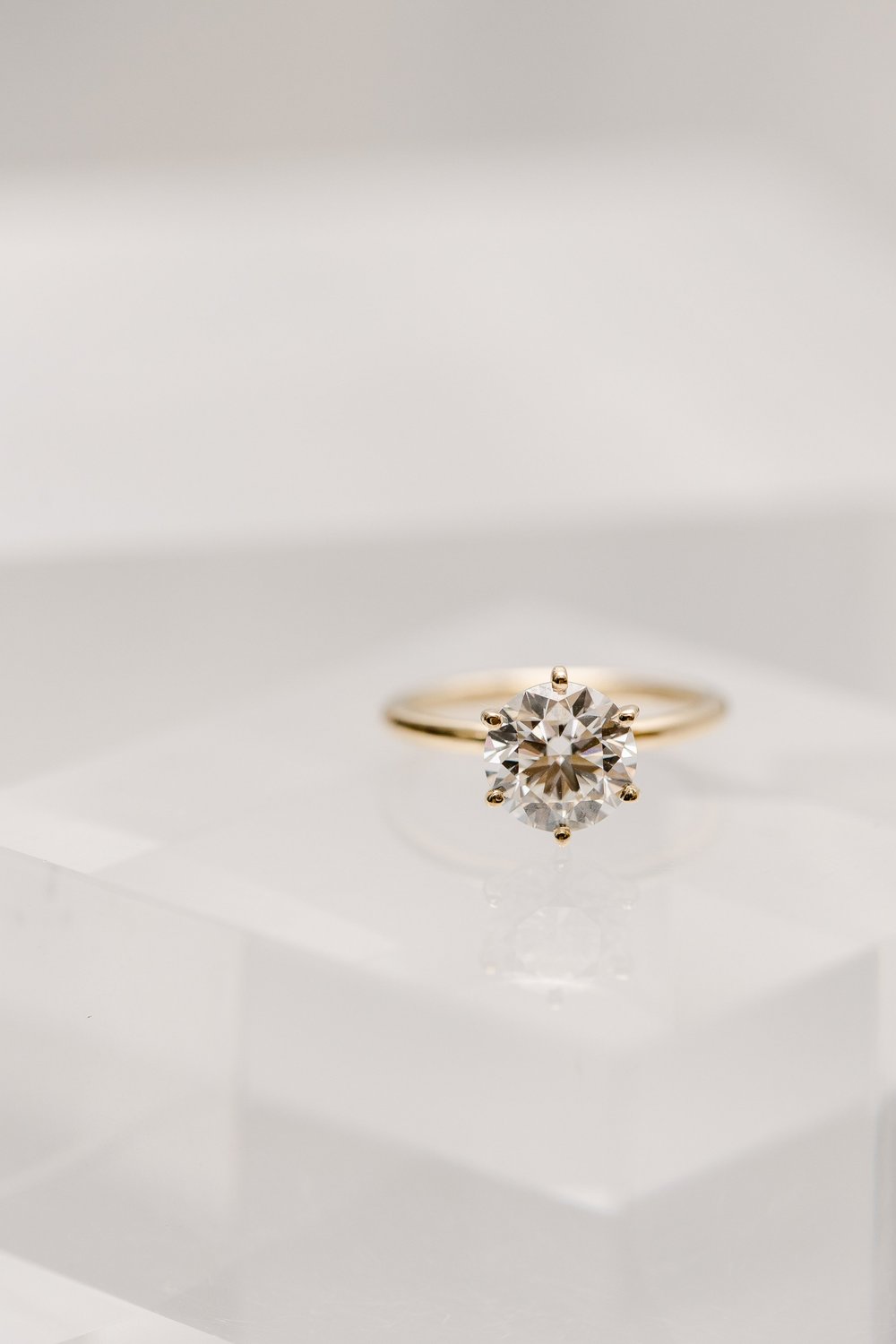 Custom designed brilliant cut yellow gold solitaire engagement ring made by Alexandria &amp; Company in Old Town Alexandria