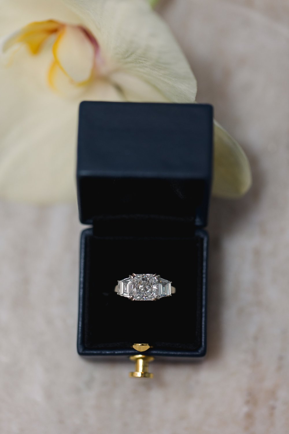 Custom designed radiant cut trapezoid diamond engagement  ring made by Alexandria &amp; Company in Old Town Alexandria 