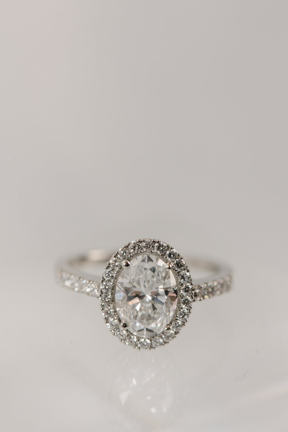 Oval cut halo diamond engagement ring made by Alexandria &amp; Company in Old Town Alexandria 