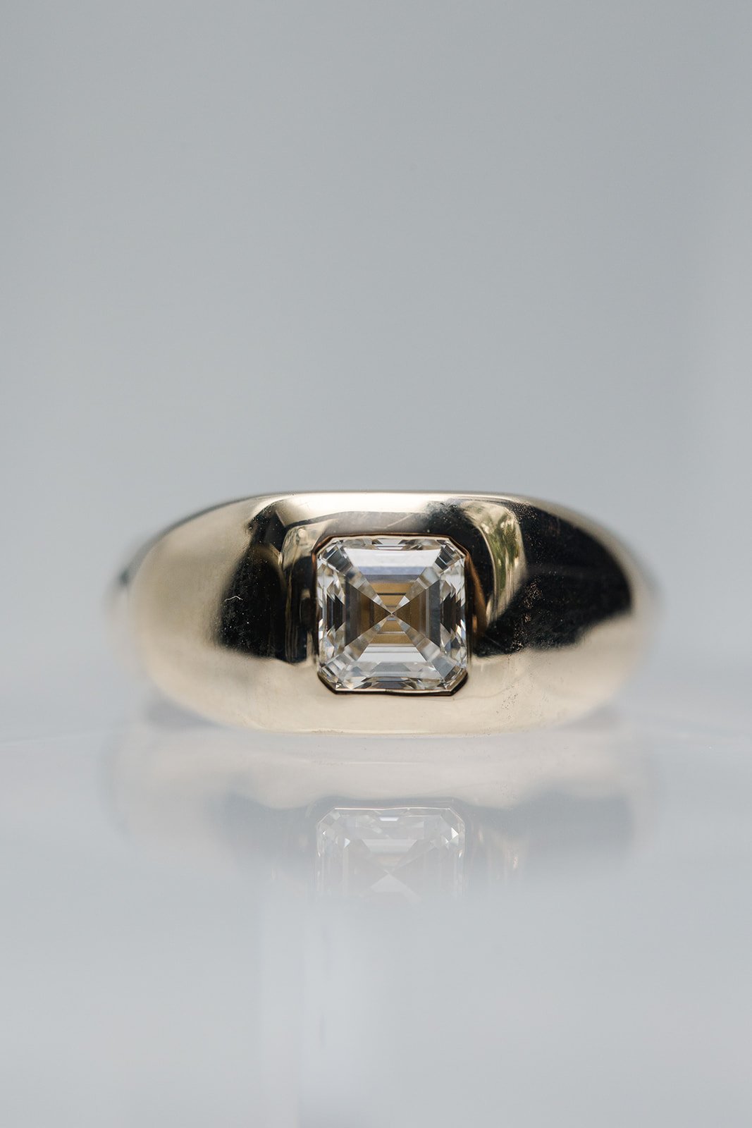 Alexandria and Company custom designed signet style yellow gold ring with Asscher cut diamond