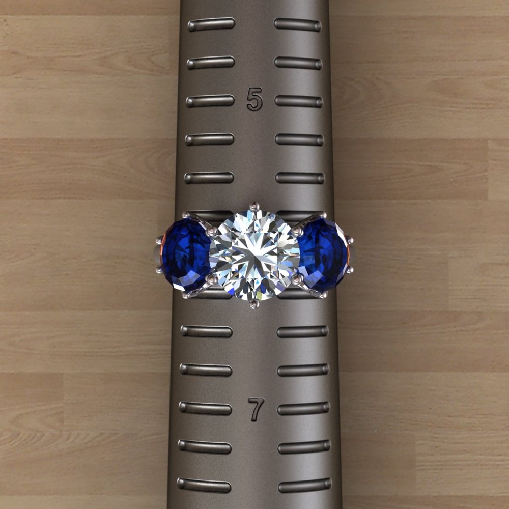 diamond and sapphire three stone ring rendering