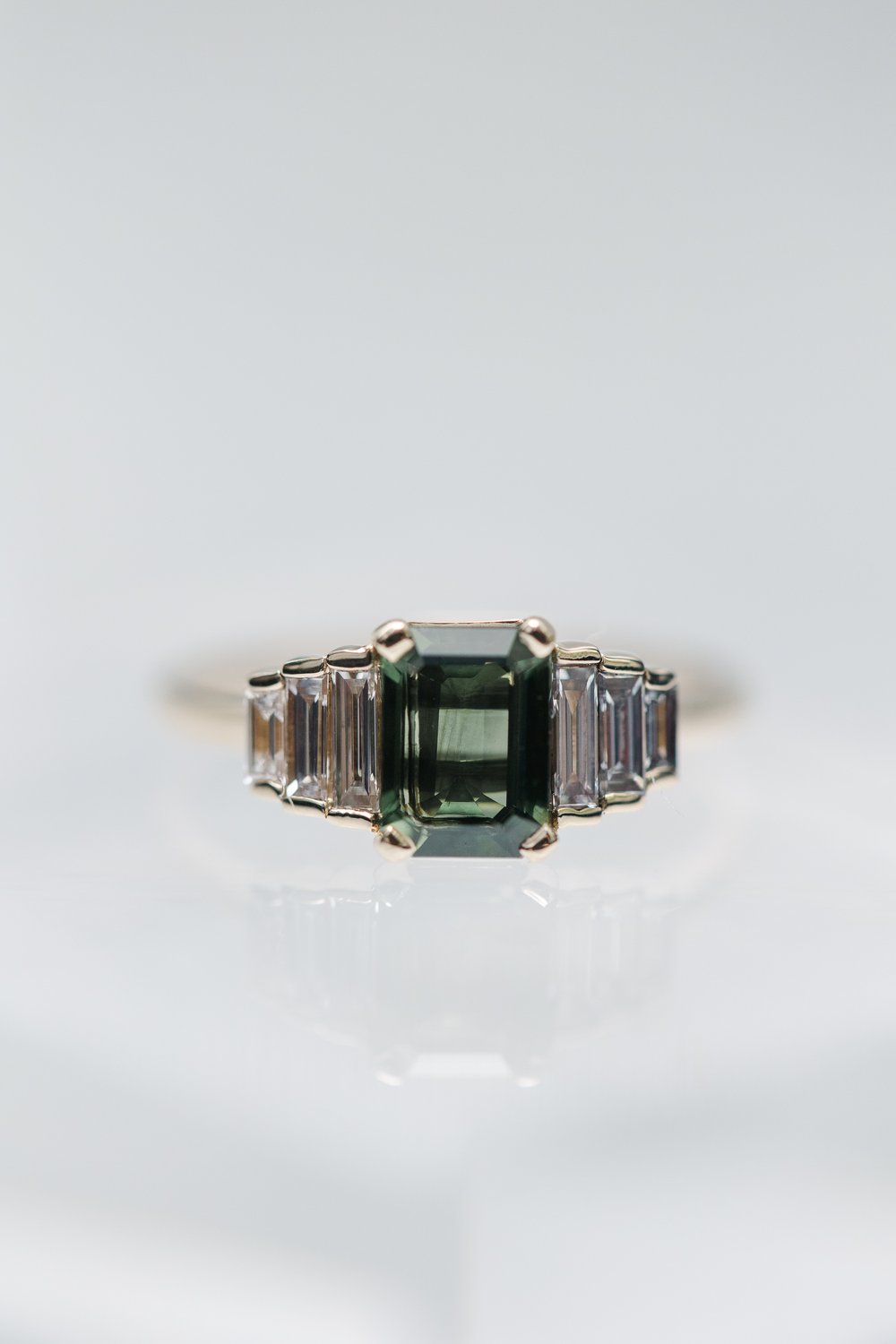 green sapphire engagement ring