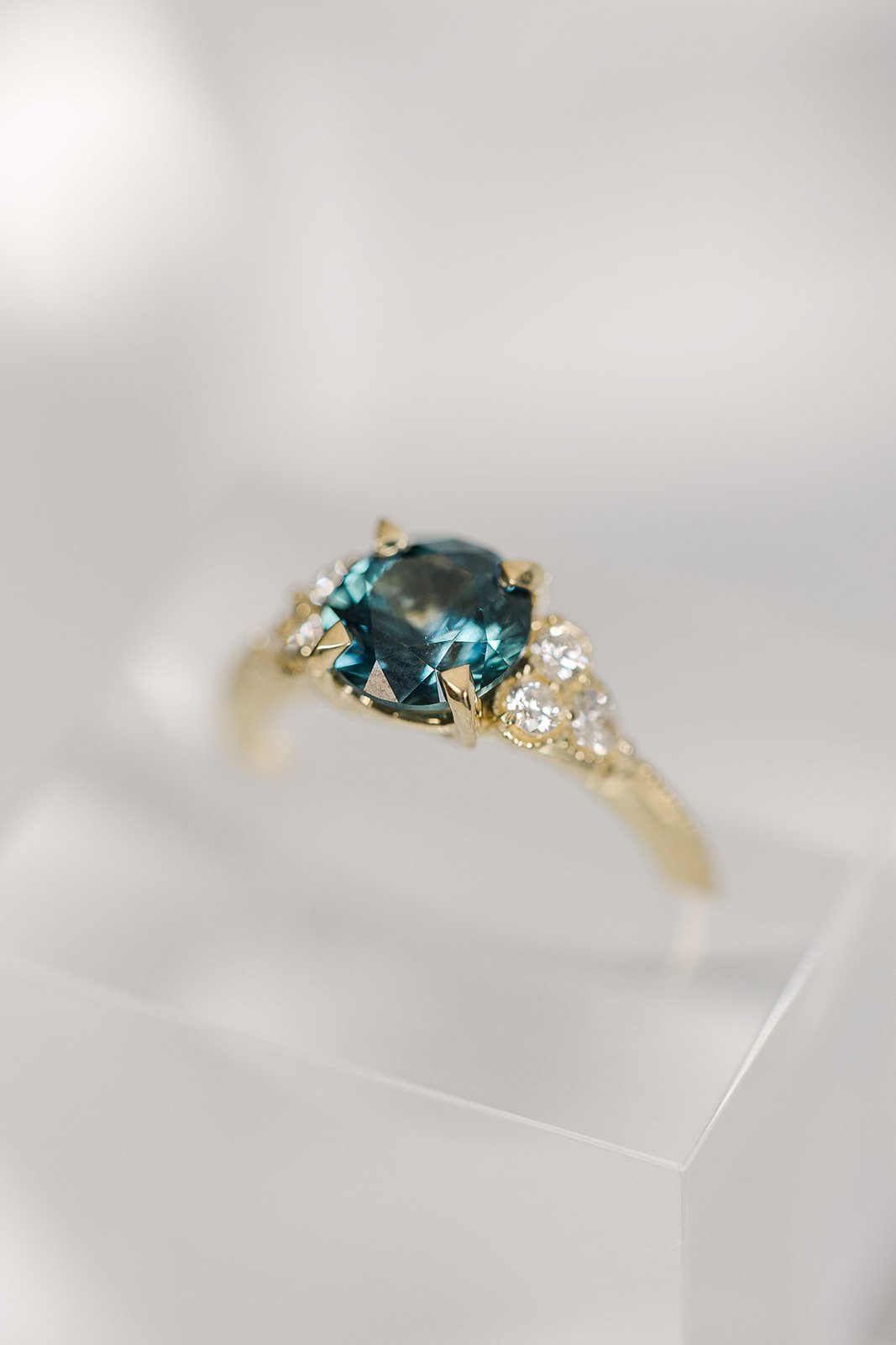 teal green sapphire engagement ring