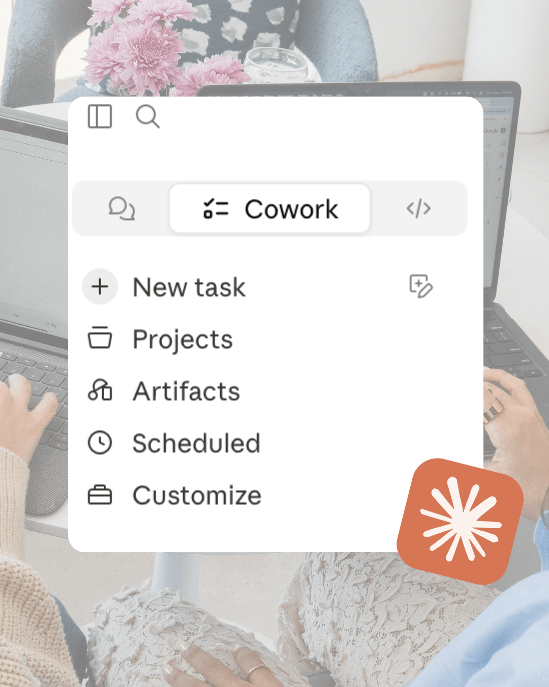 Screenshot of the Cowork app menu showing New Task, Projects, Artifacts, Scheduled, and Customize options, overlaid on a photo of someone typing on a laptop with pink flowers in the background.